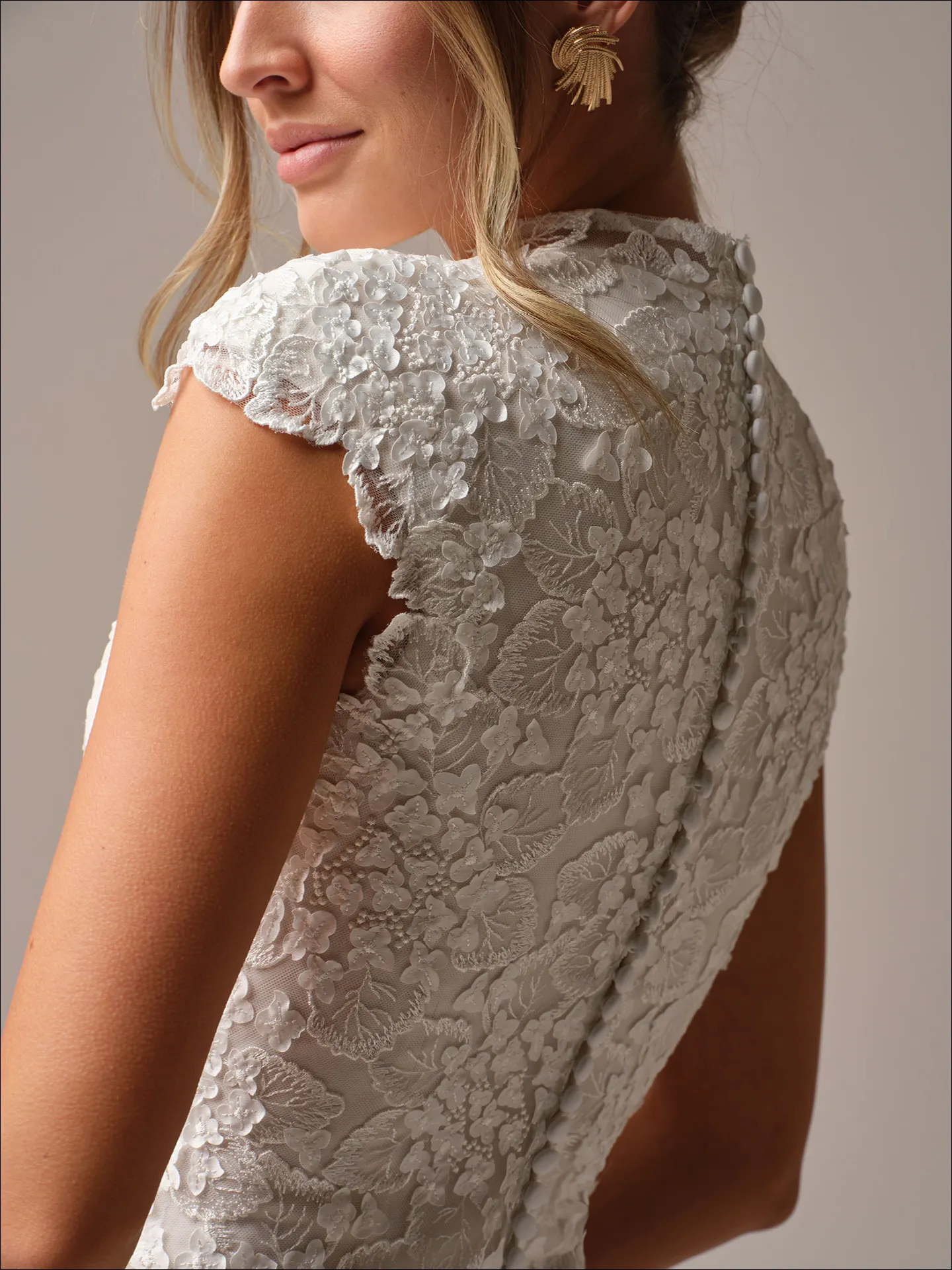 Maggie Sottero Auburn Leigh back view lace sheath cap-sleeve wedding dress