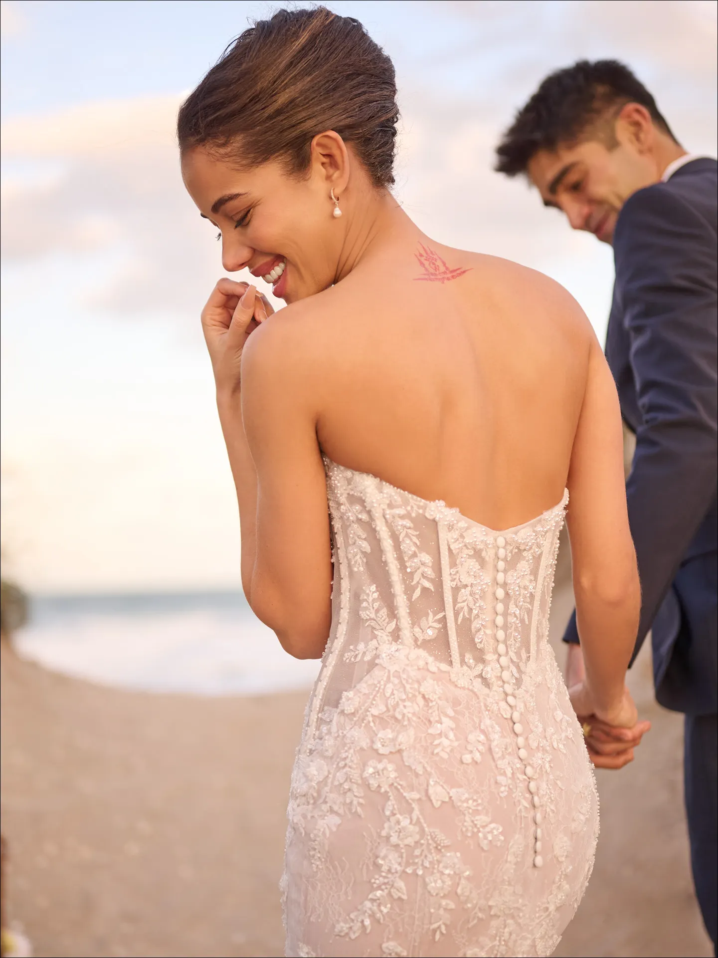 Benjie Royale back view, shimmering beaded mermaid wedding dress by Maggie Sottero