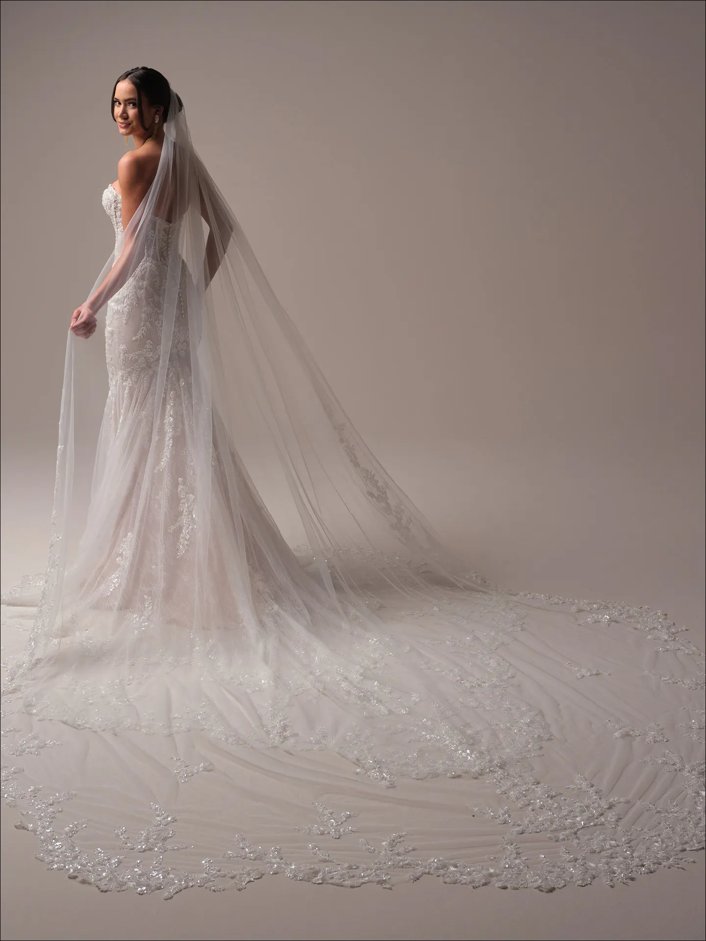 Benjie Royale back view, shimmering beaded mermaid wedding dress with long train, Maggie Sottero