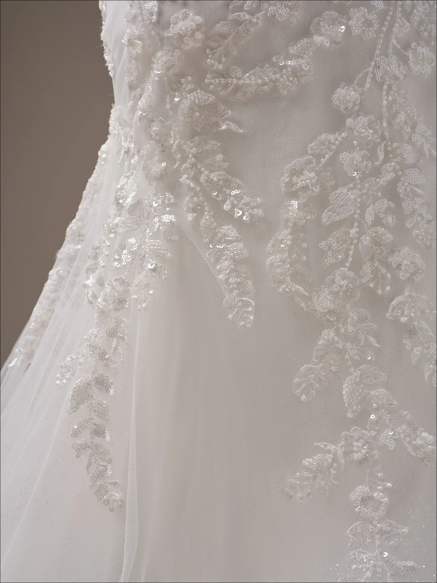 Maggie Sottero Benjie Royale close-up of shimmering beaded lace on mermaid wedding dress