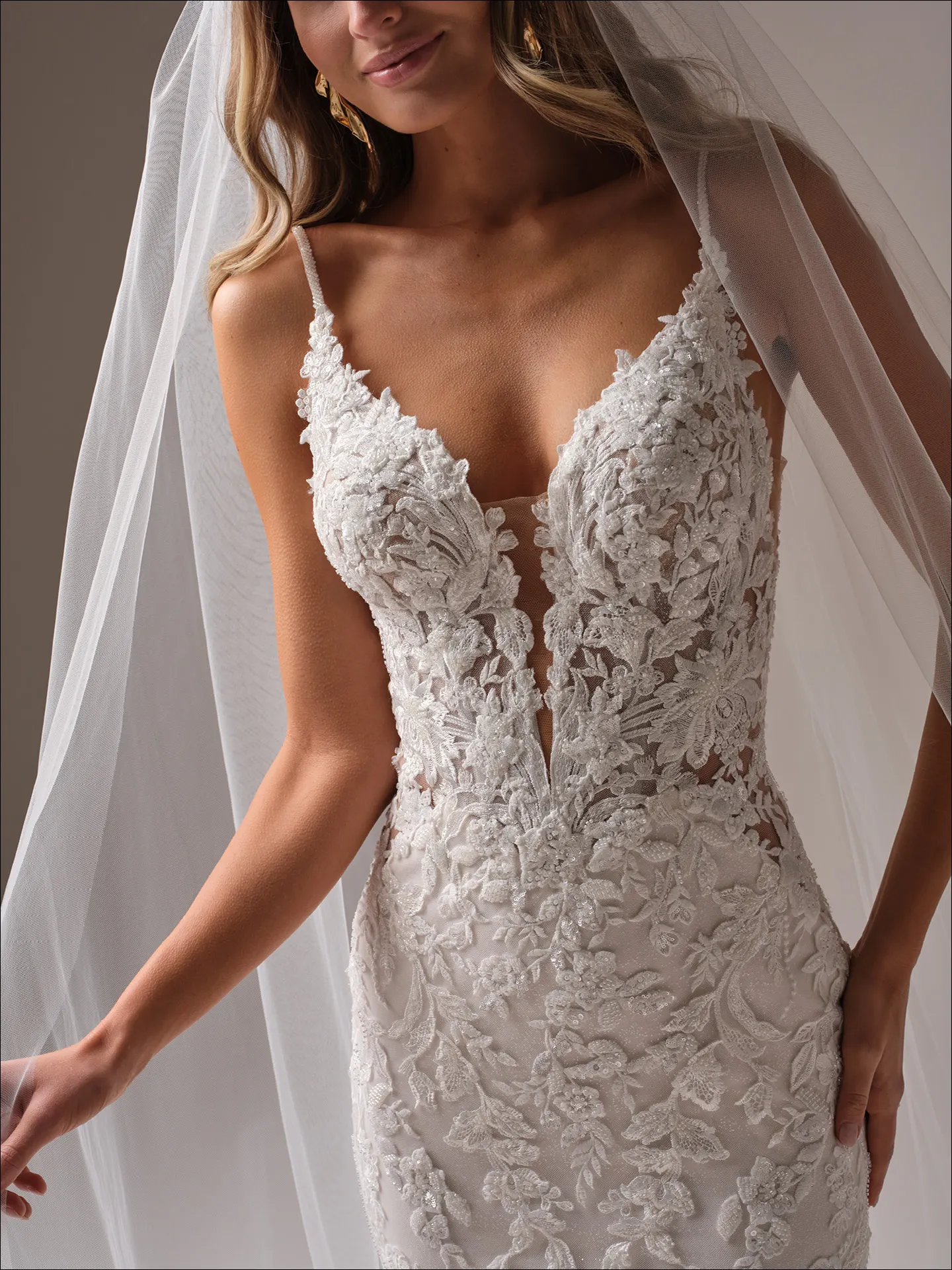 Maggie Sottero Bianca front view beaded fit-and-flare wedding gown with plunge neckline