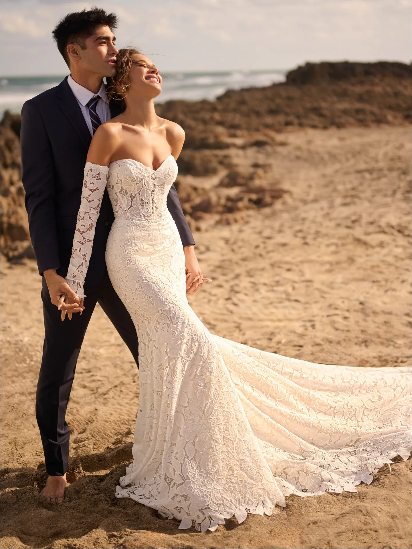 Dakota lace mermaid bridal dress on beach, front view Maggie Sottero