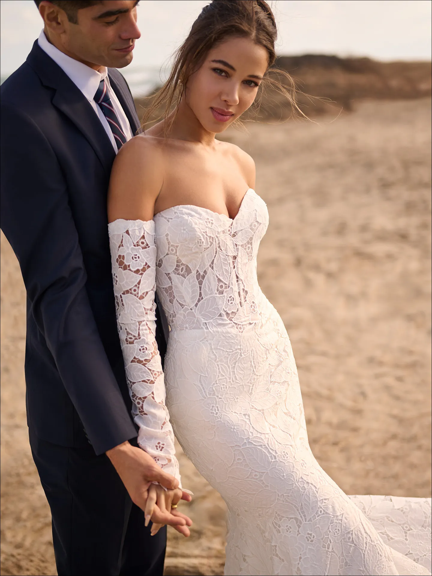 Maggie Sottero Dakota front view boho lace mermaid bridal dress on beach
