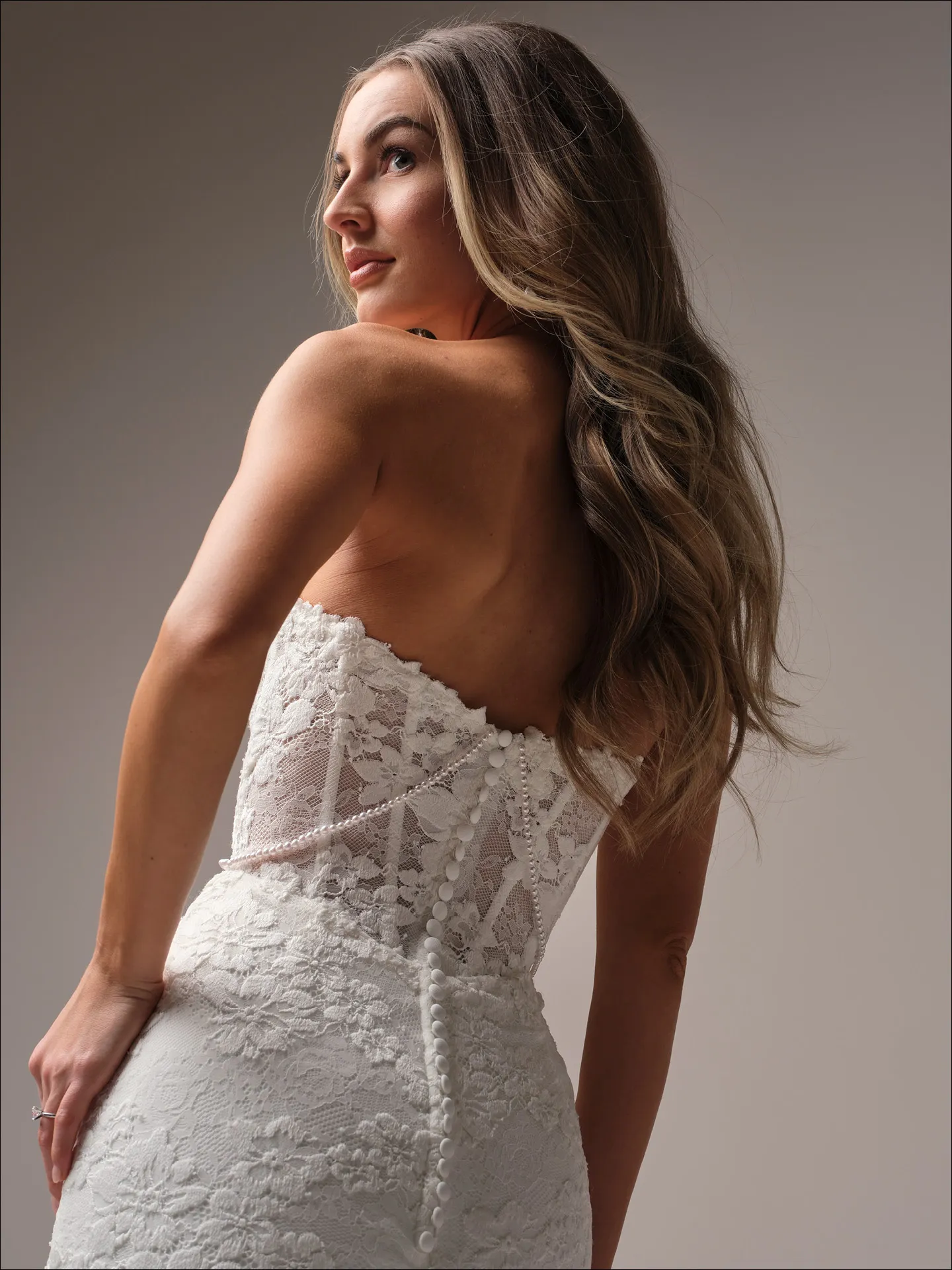 Maggie Sottero Devon back view of lace pearl corset mermaid wedding dress