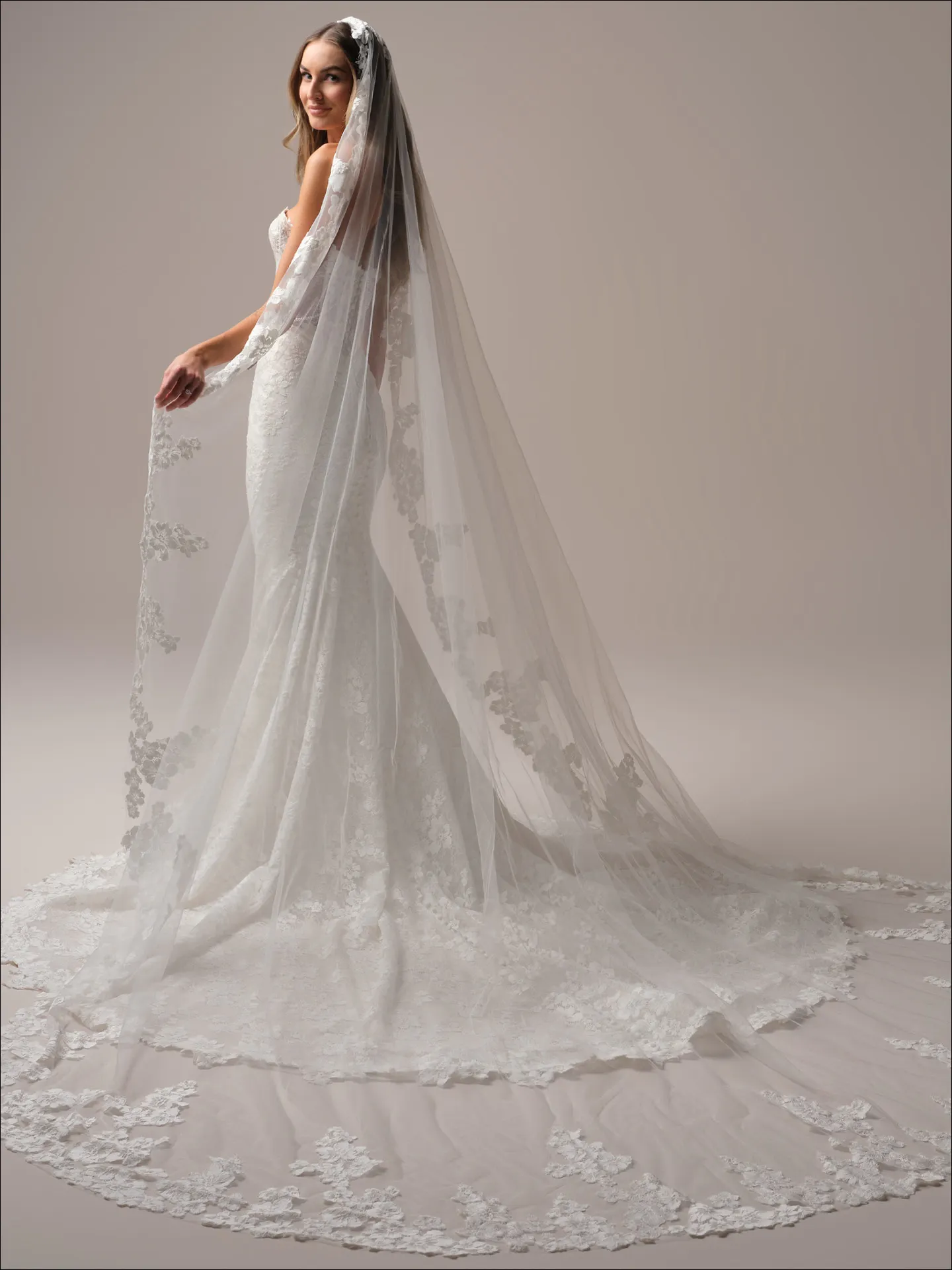 Devon mermaid gown with lace and pearl accents, Maggie Sottero, side view with veil