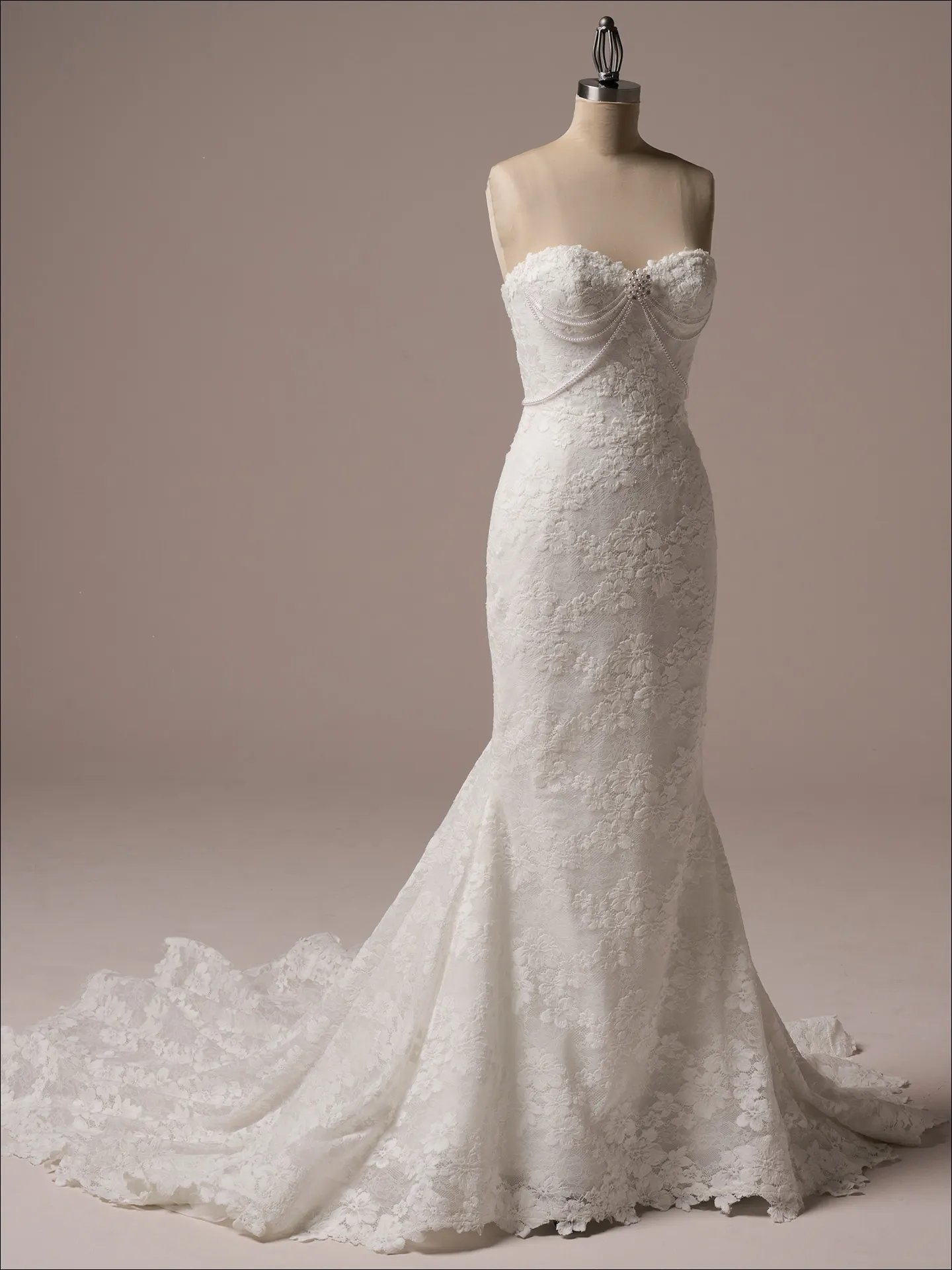 Maggie Sottero Devon lace mermaid gown on mannequin