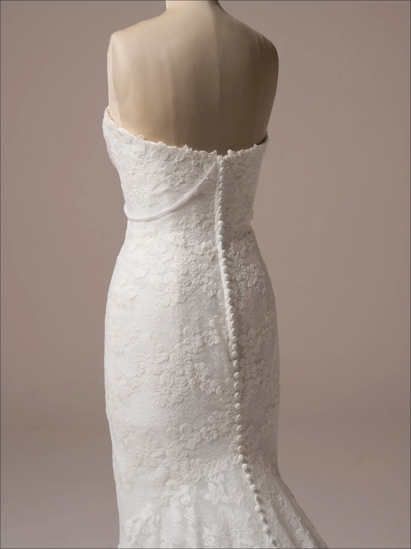 Maggie Sottero Devon back view lace mermaid wedding dress with pearl buttons