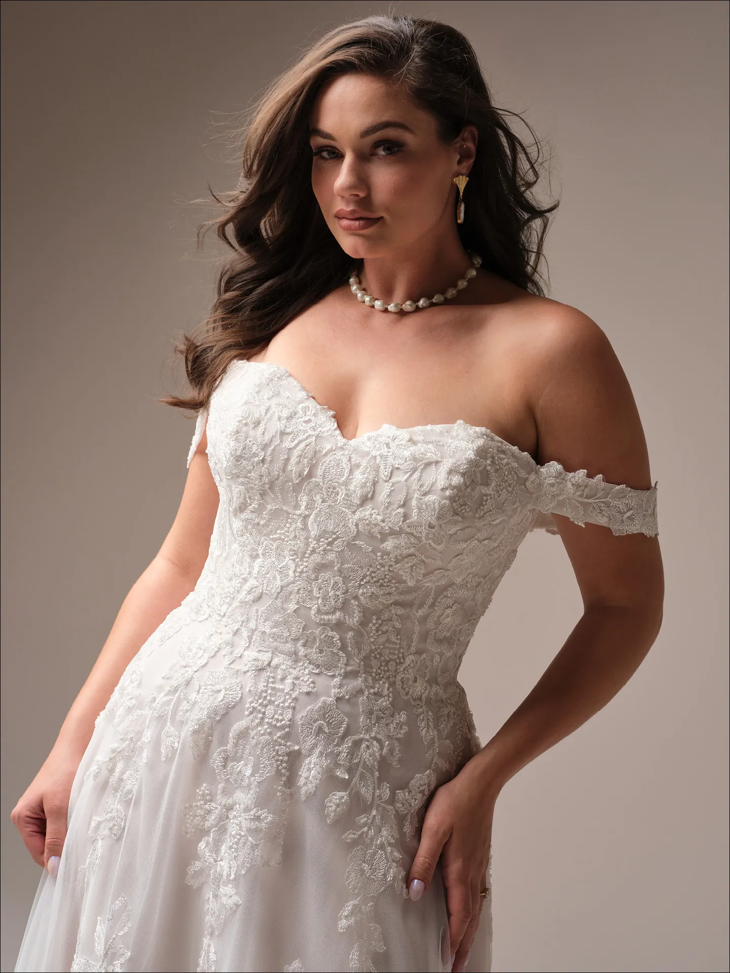 Maggie Sottero Everleigh off-the-shoulder lace A-line bridal dress front view