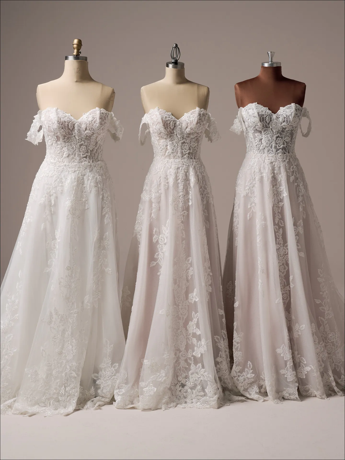 Maggie Sottero Everleigh lace A-line wedding dresses on mannequins front view