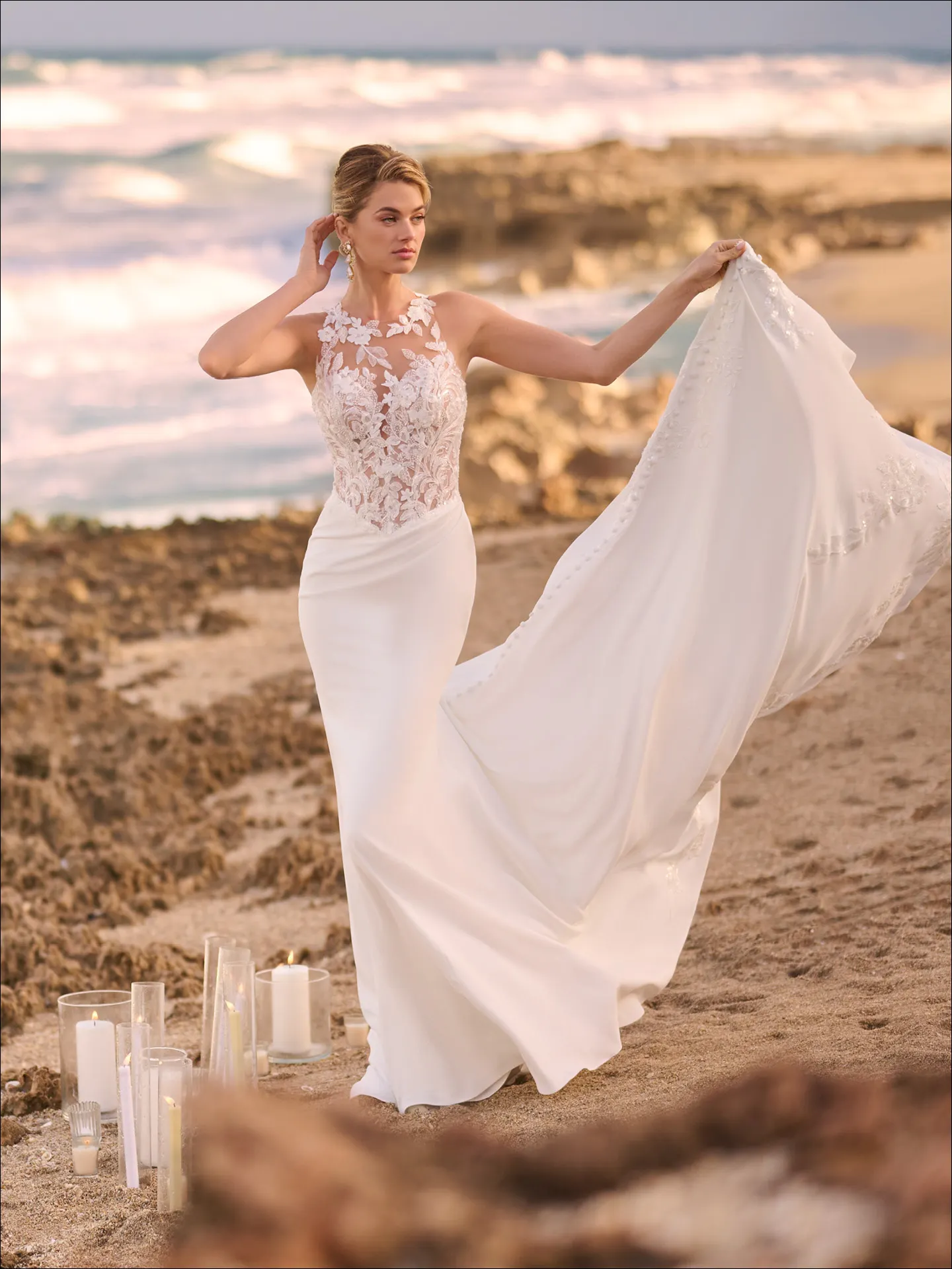 Maggie Sottero Florentina front view on beach with lace halter neck and crepe fit-and-flare gown
