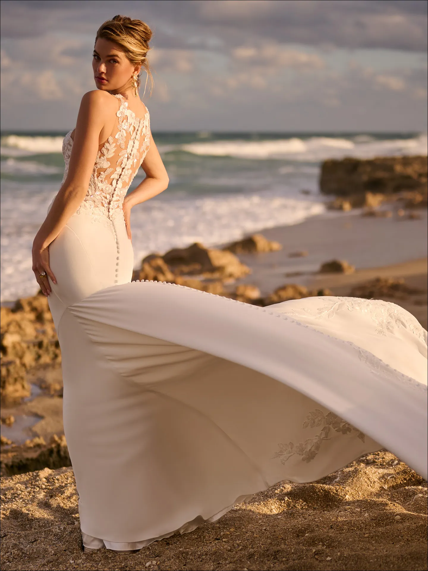 Florentina fit-and-flare dress back view by beach, lace detail, Maggie Sottero