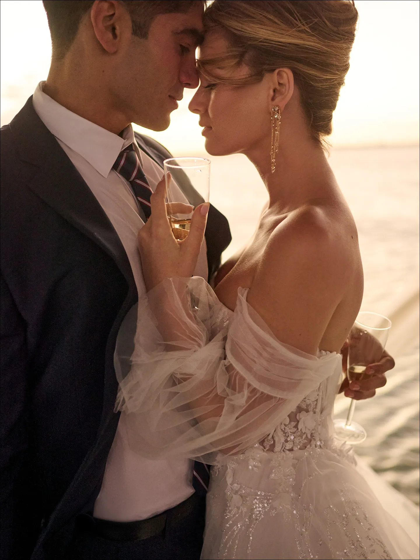 Maggie Sottero Ireland A line wedding dress side view with flowing layered tulle skirt