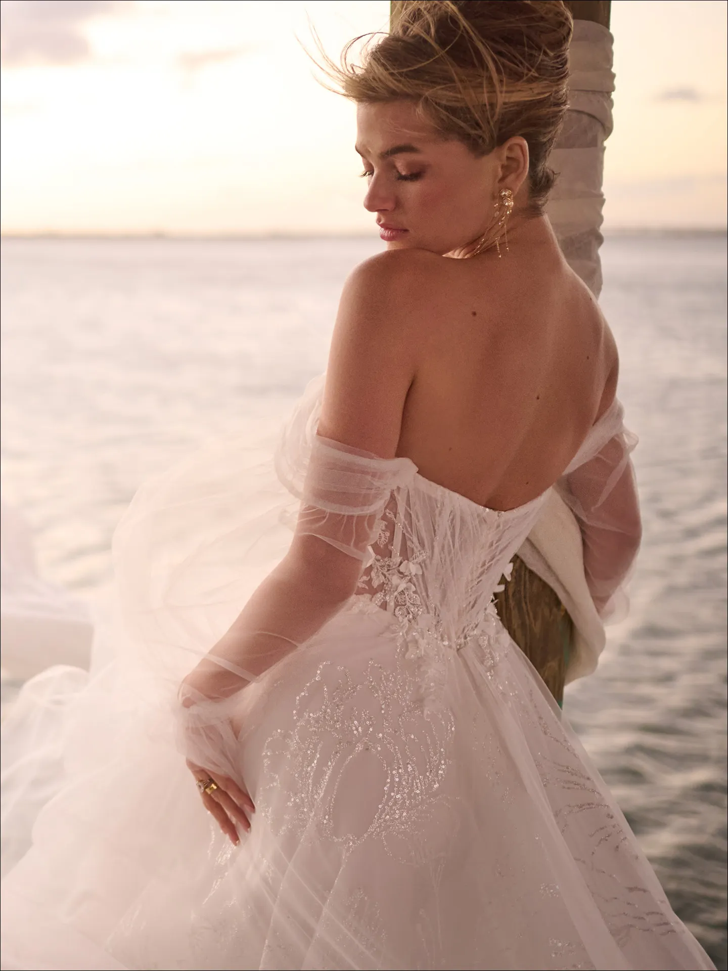 Maggie Sottero Ireland A line wedding dress side view with soft tulle skirt