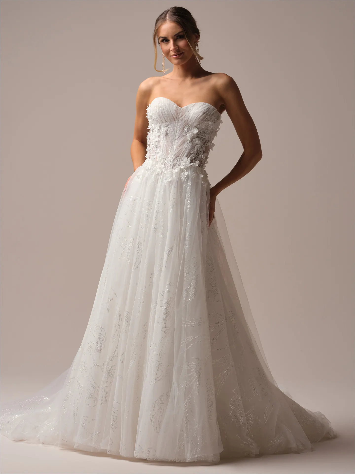 Maggie Sottero Ireland A line wedding dress back view with flowing tulle train