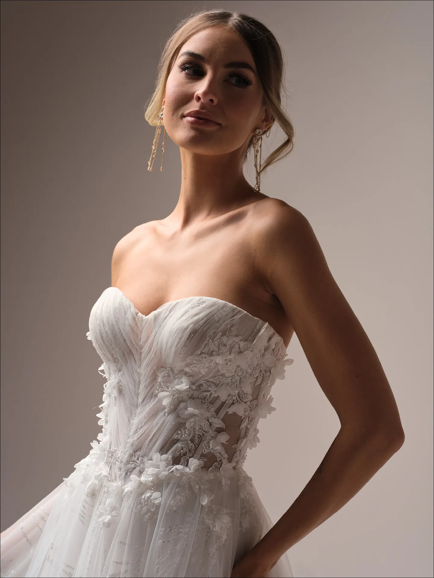 Maggie Sottero Ireland A line wedding dress side view with fitted lace bodice