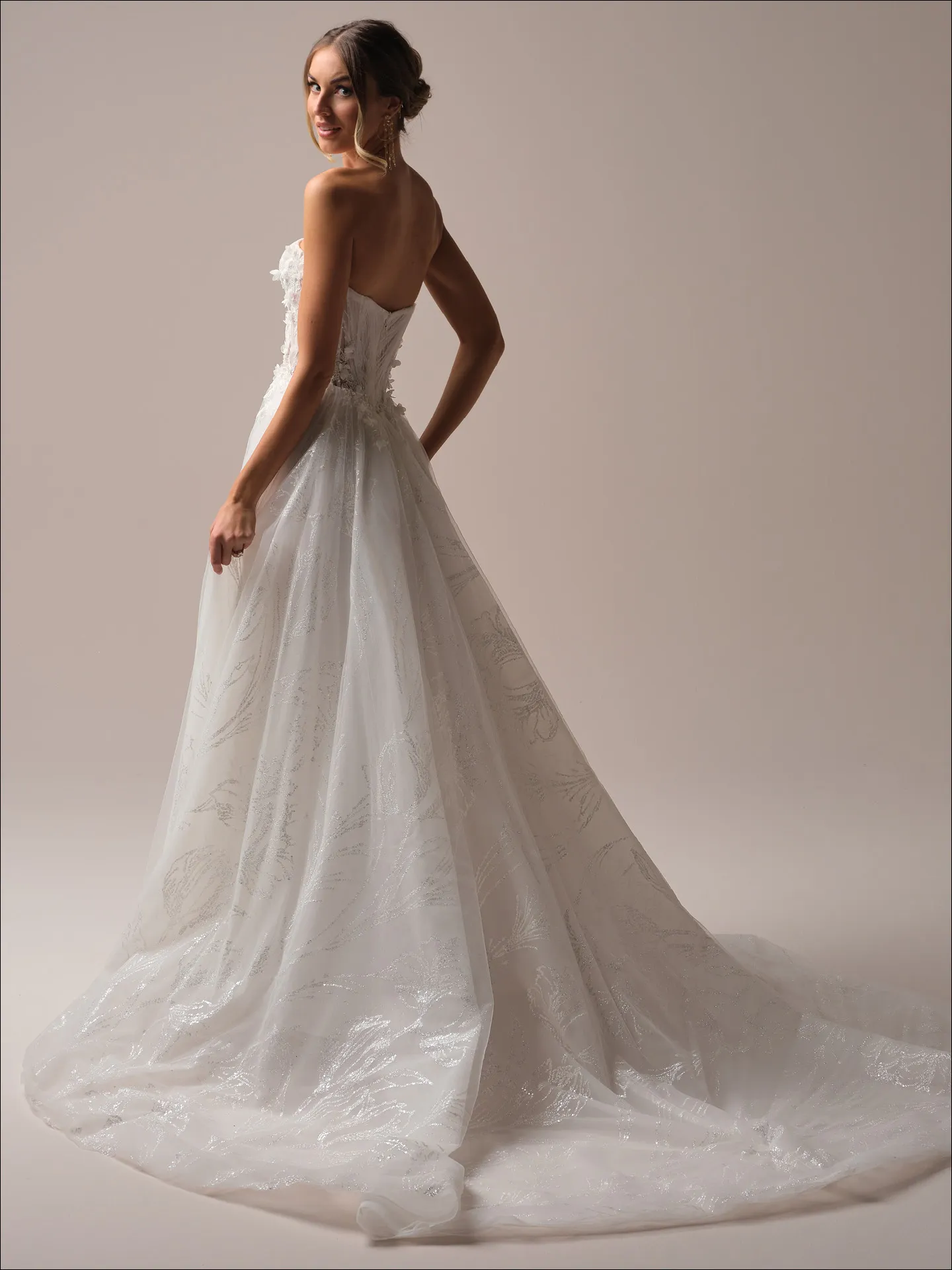 Maggie Sottero Ireland A line wedding dress back view with lace and tulle train