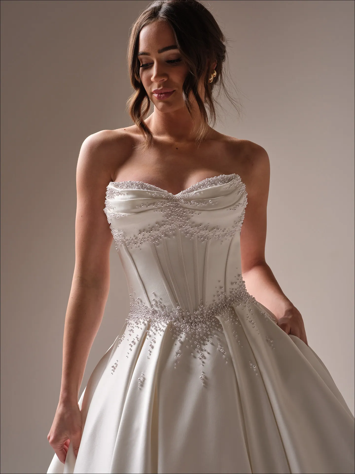 Maggie Sottero Juneau ballgown wedding dress back view with long flowing train