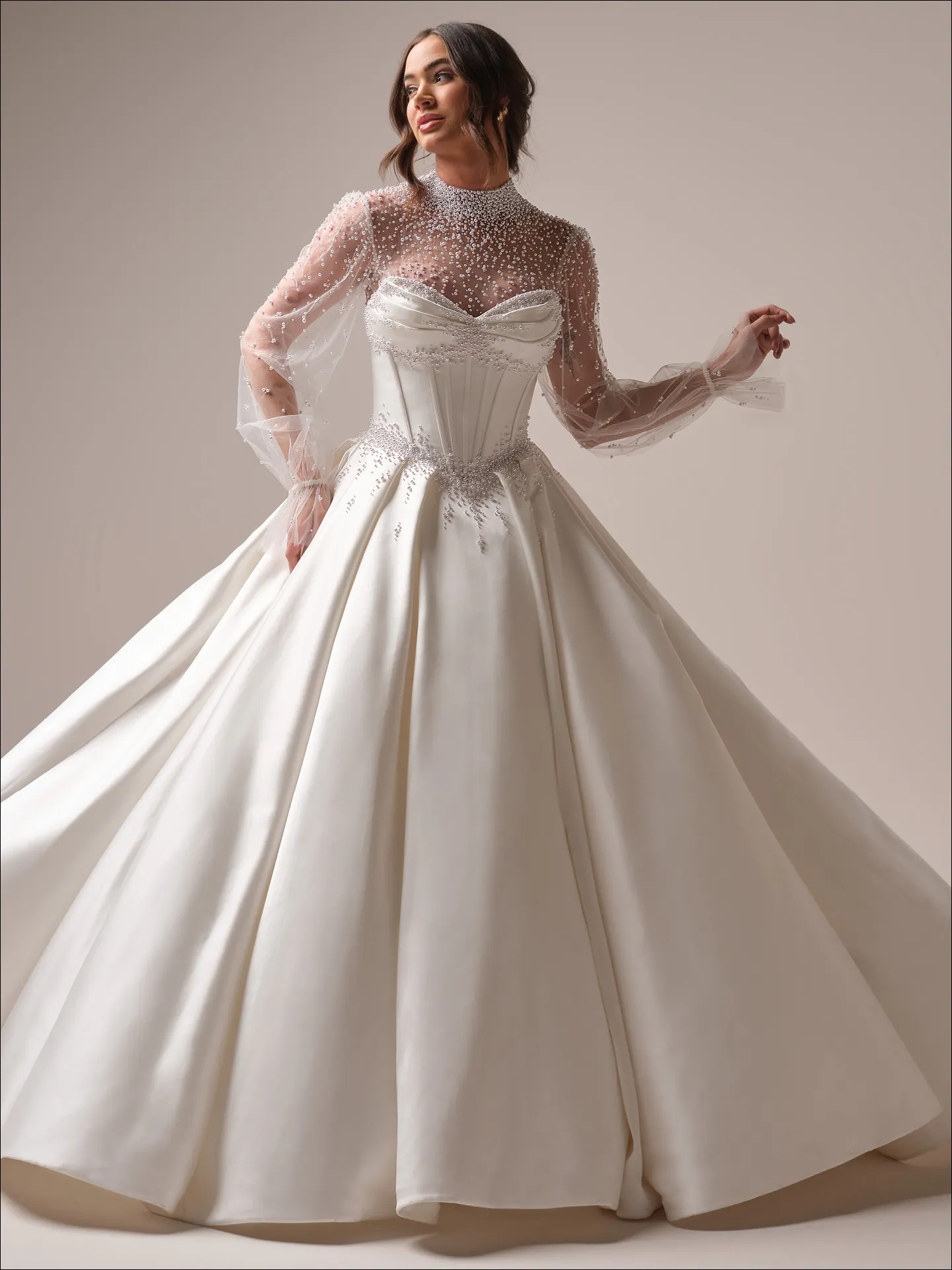 Maggie Sottero Juneau ballgown wedding dress side view with fitted bodice and full skirt