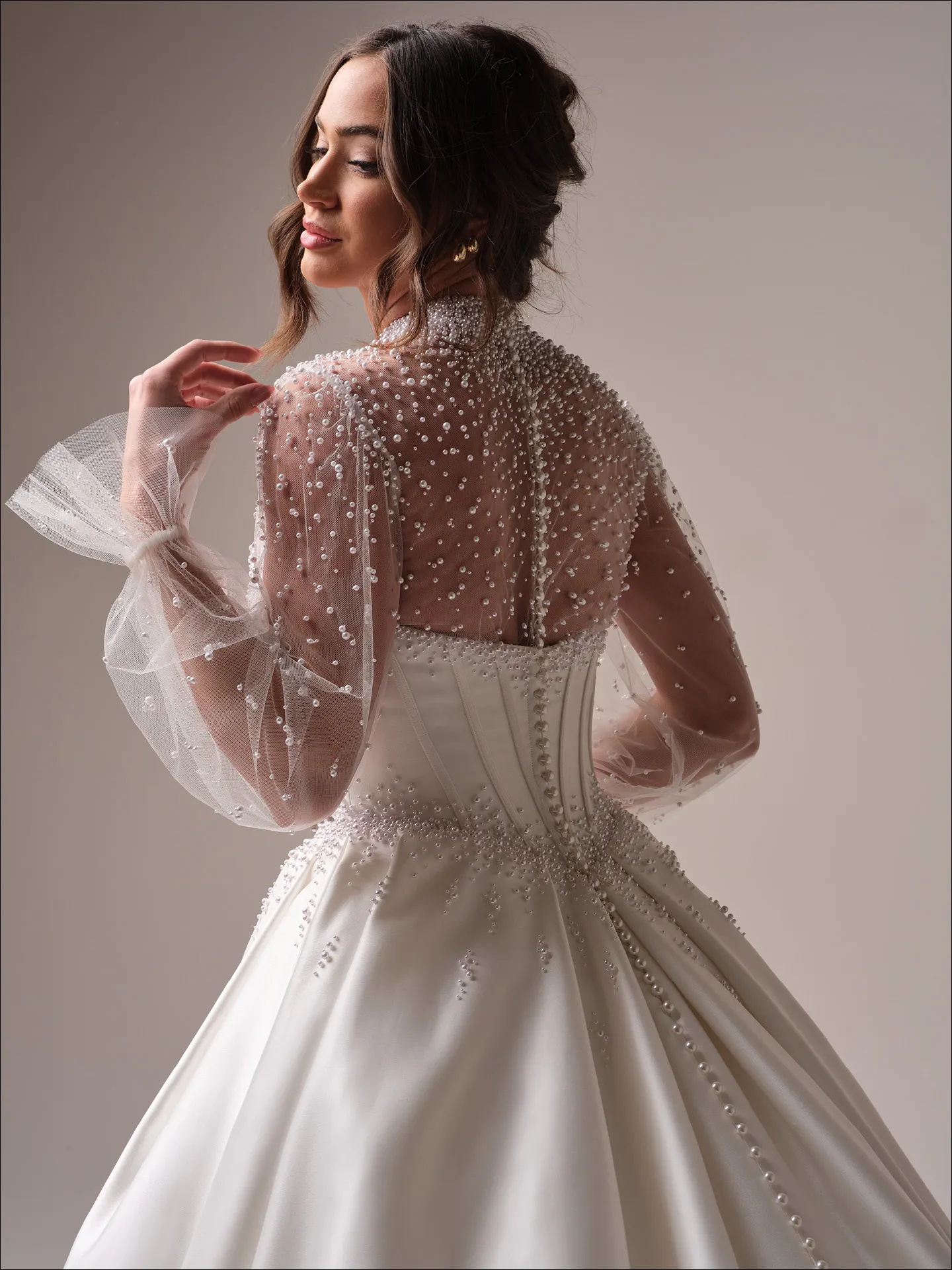 Maggie Sottero Juneau ballgown wedding dress side view with structured bodice