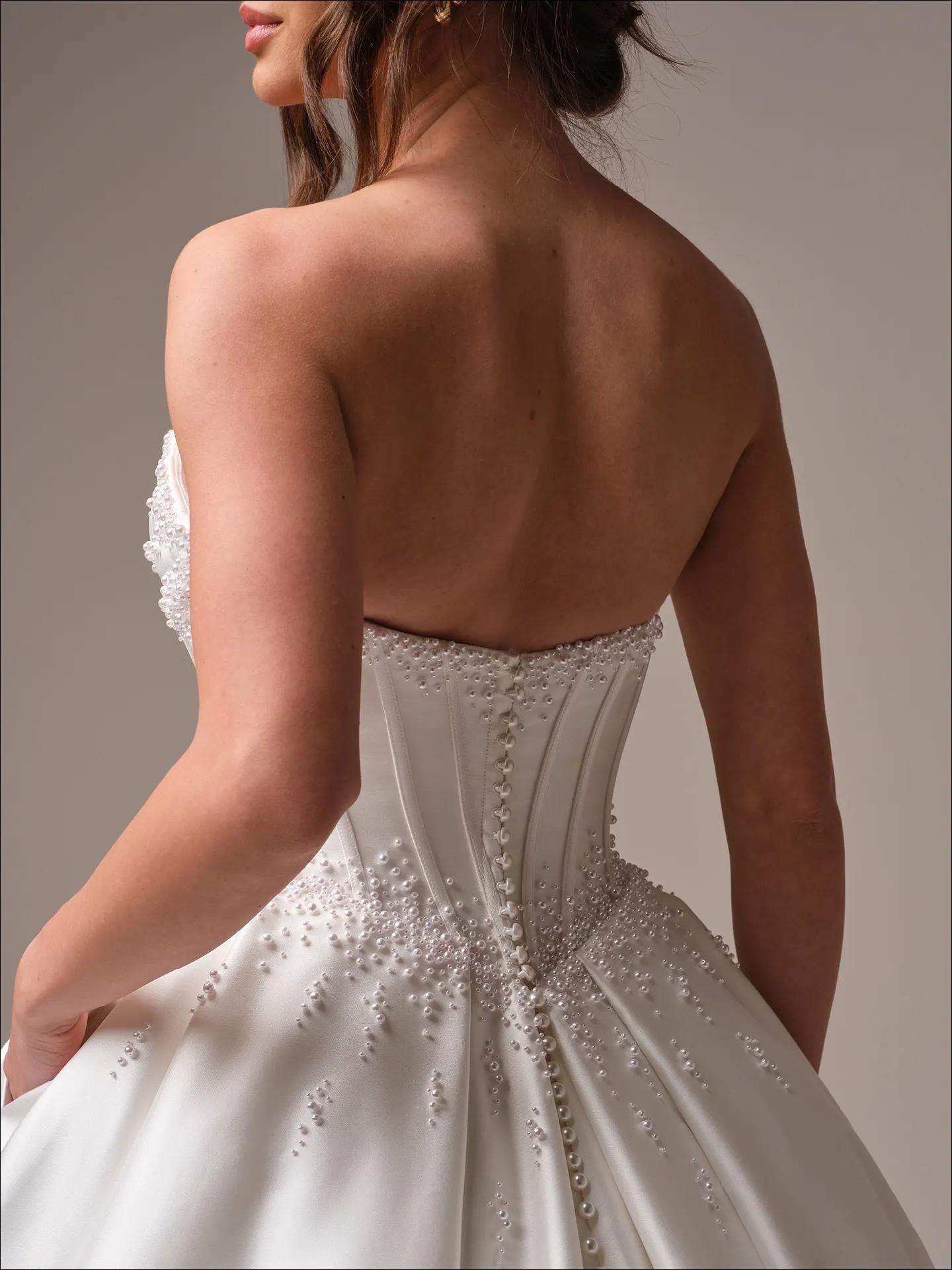 Maggie Sottero Juneau ballgown wedding dress back view with wide tulle train