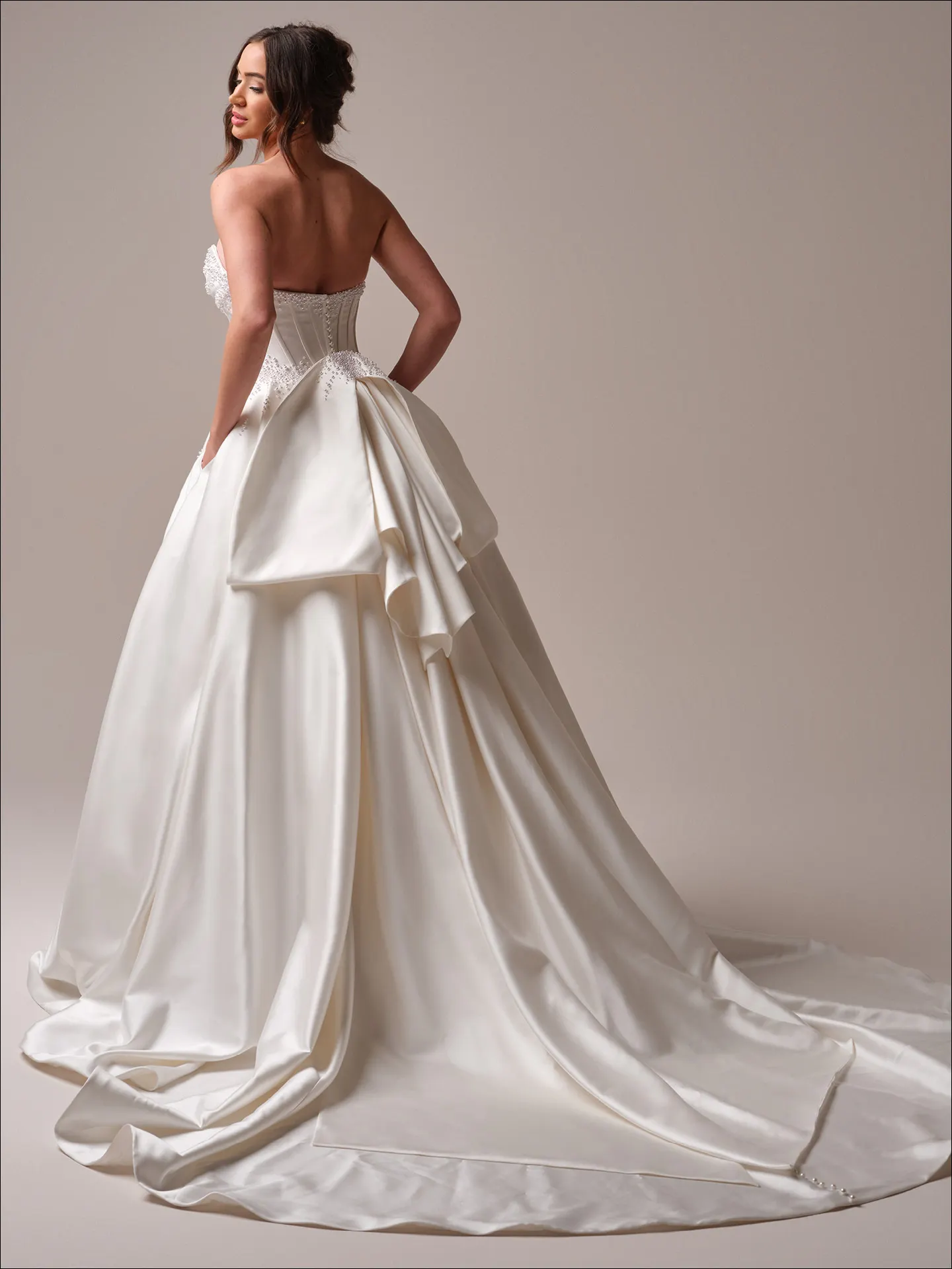 Maggie Sottero Juneau ballgown wedding dress side view with voluminous skirt
