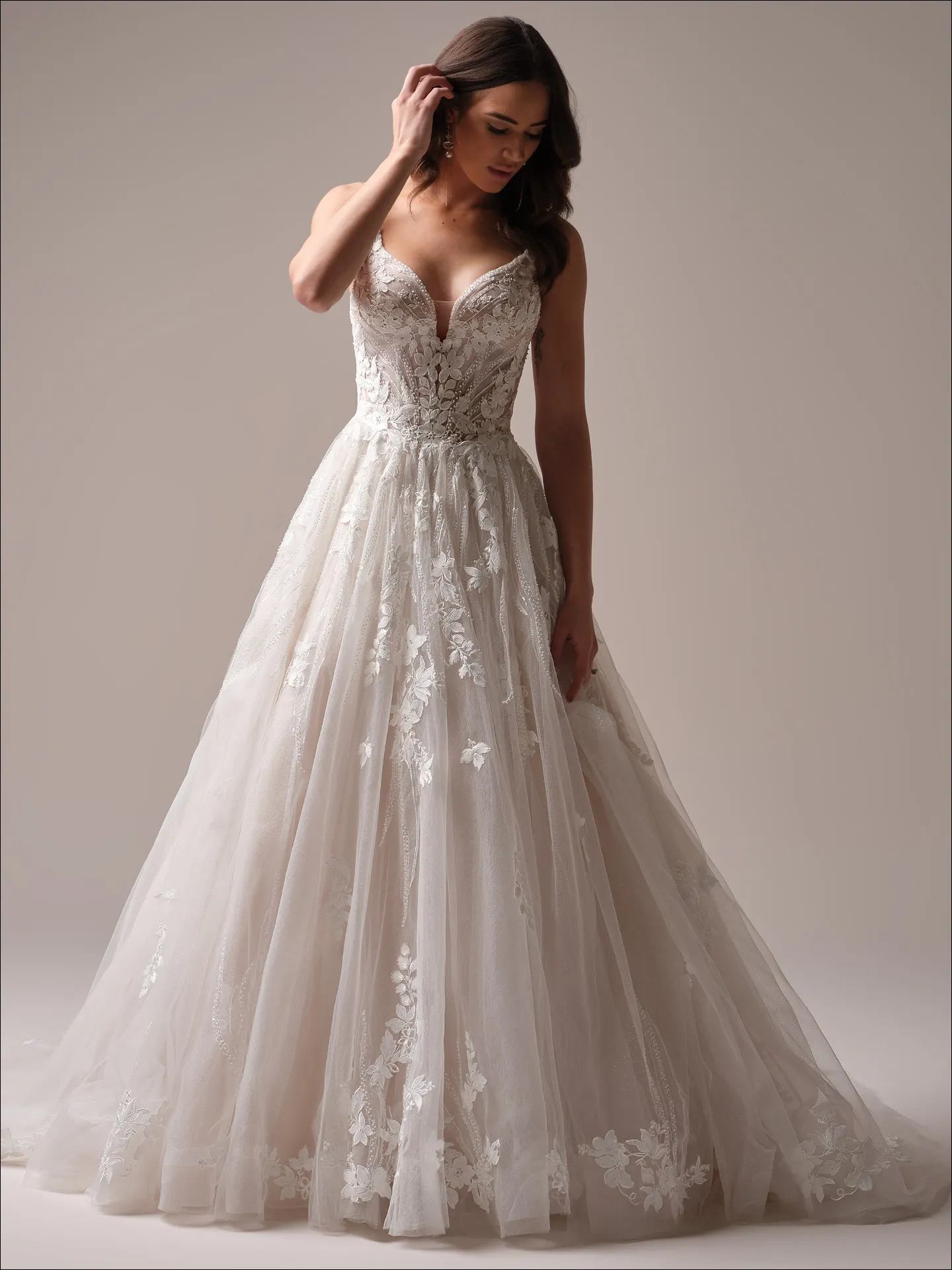Maggie Sottero Juneau ballgown wedding dress front view with structured bodice and full skirt