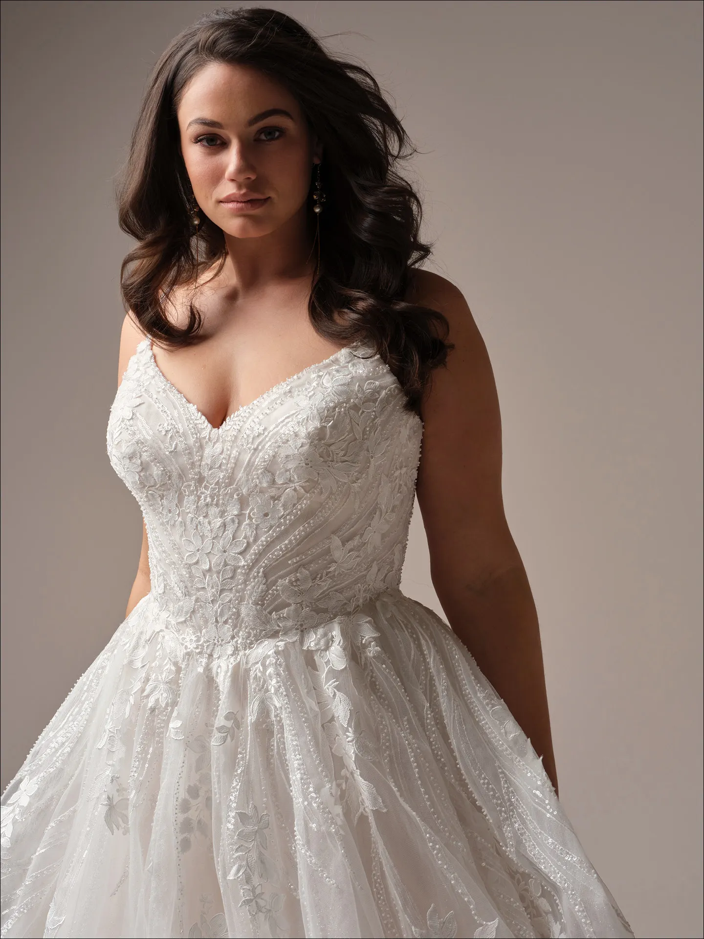 Maggie Sottero Juneau ballgown wedding dress rear angle with sweeping train detail