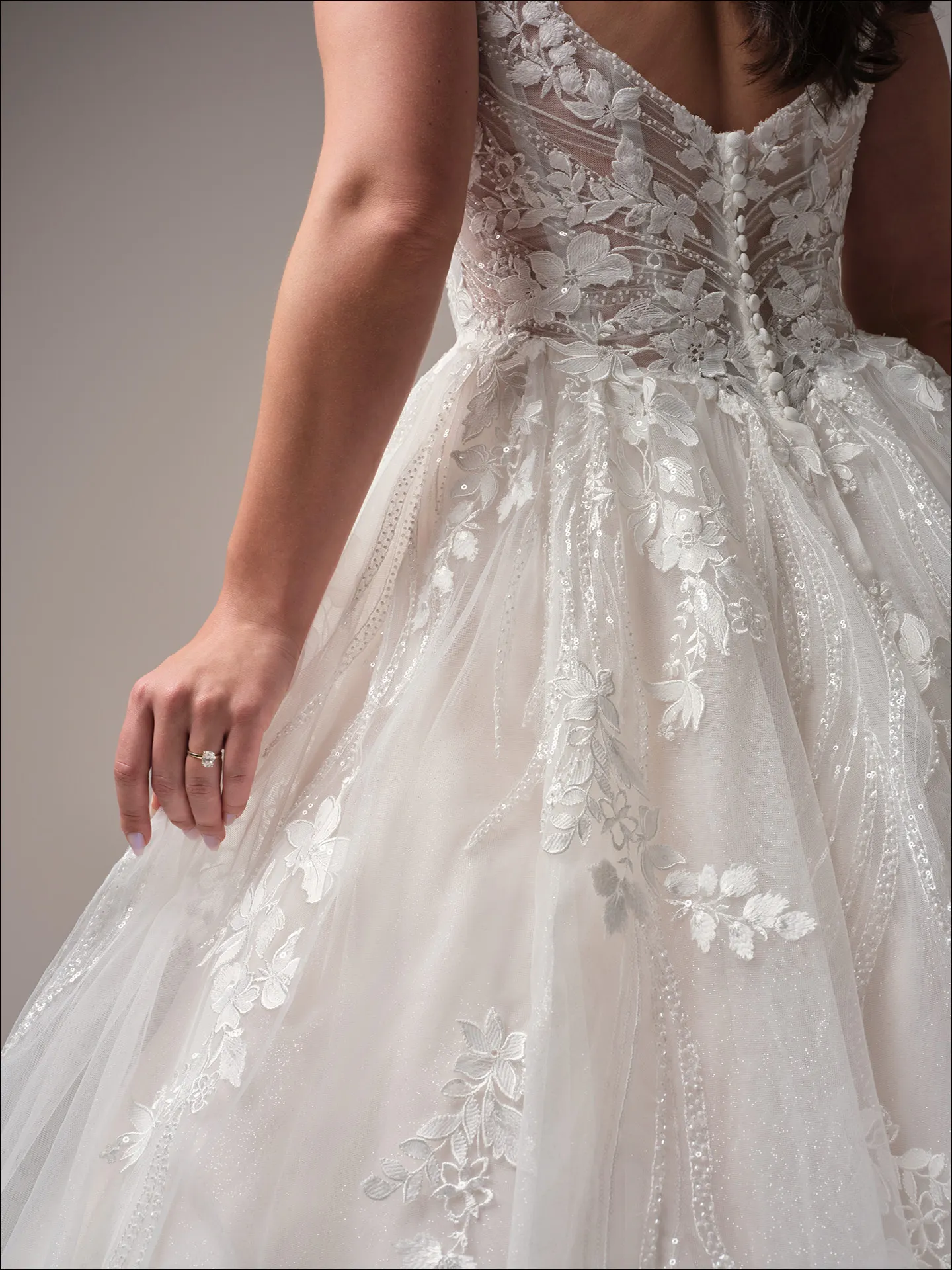 Maggie Sottero Juneau ballgown wedding dress side view with structured bodice