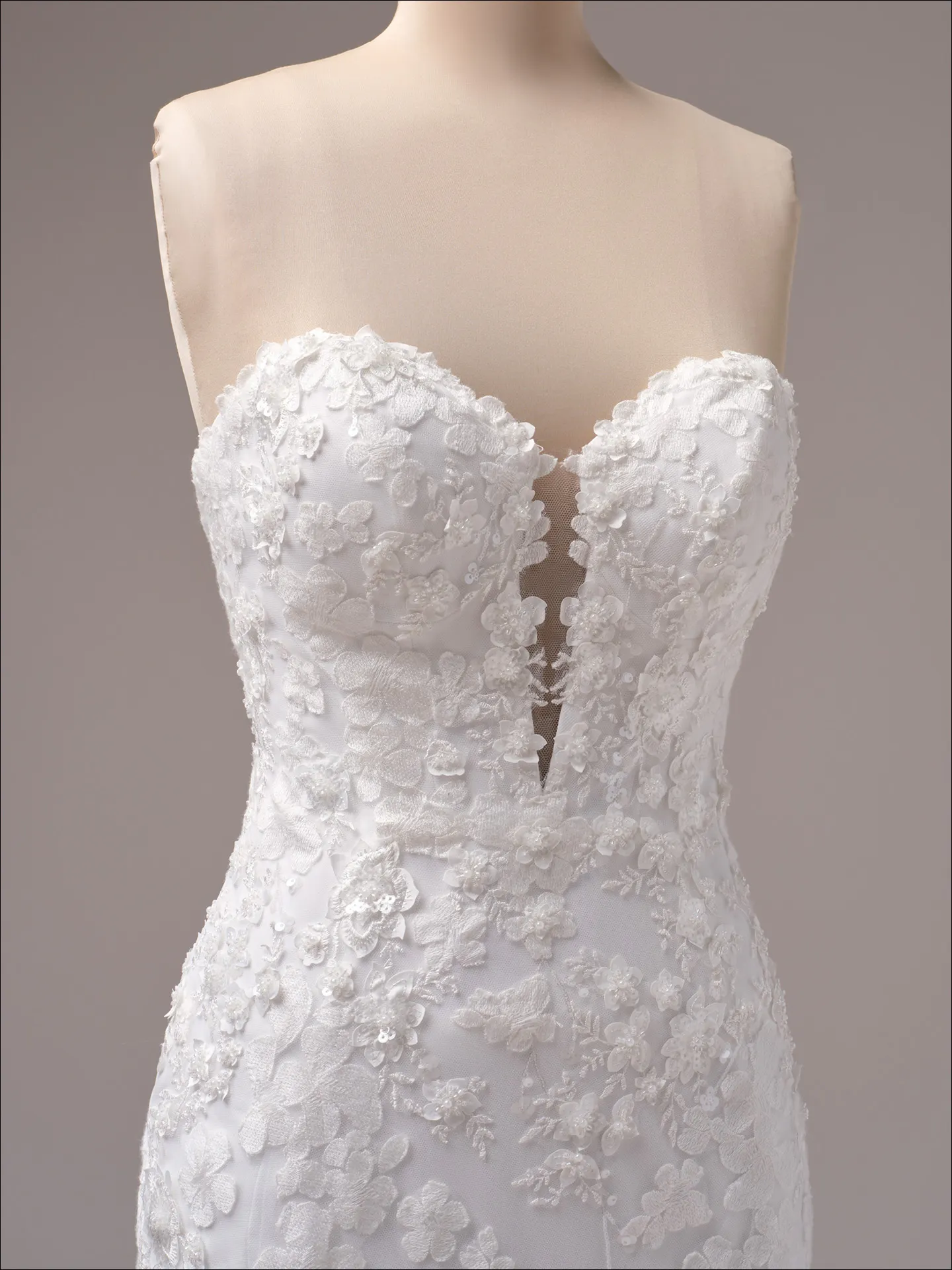 Maggie Sottero Liberty ballgown wedding dress side angle with defined waist