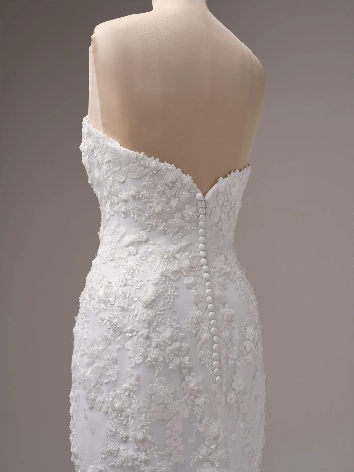 Maggie Sottero Liberty ballgown wedding dress rear view with extended train spread