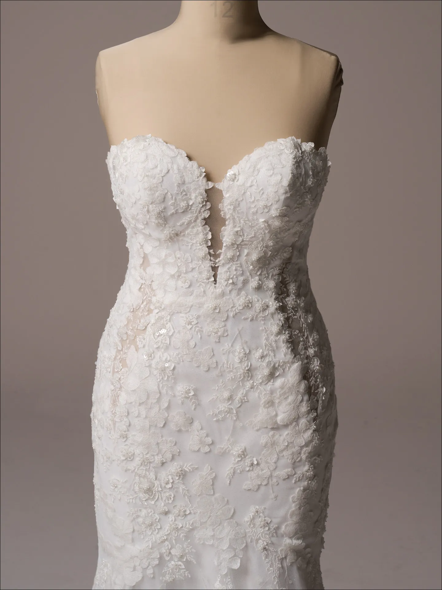 Maggie Sottero Liberty ballgown wedding dress front view in ivory tone full skirt