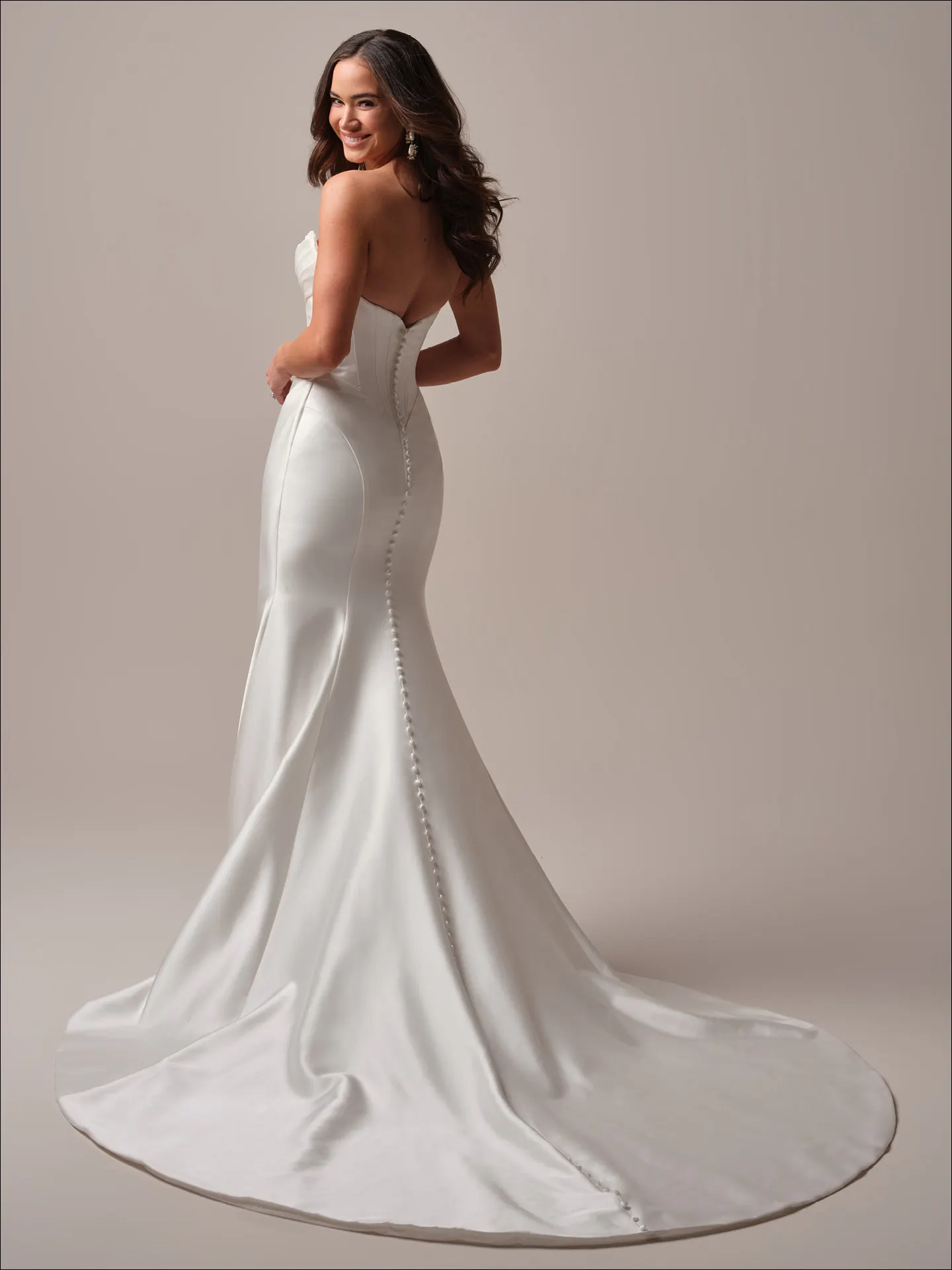 Maggie Sottero Melissa fit and flare wedding dress back view with lace train