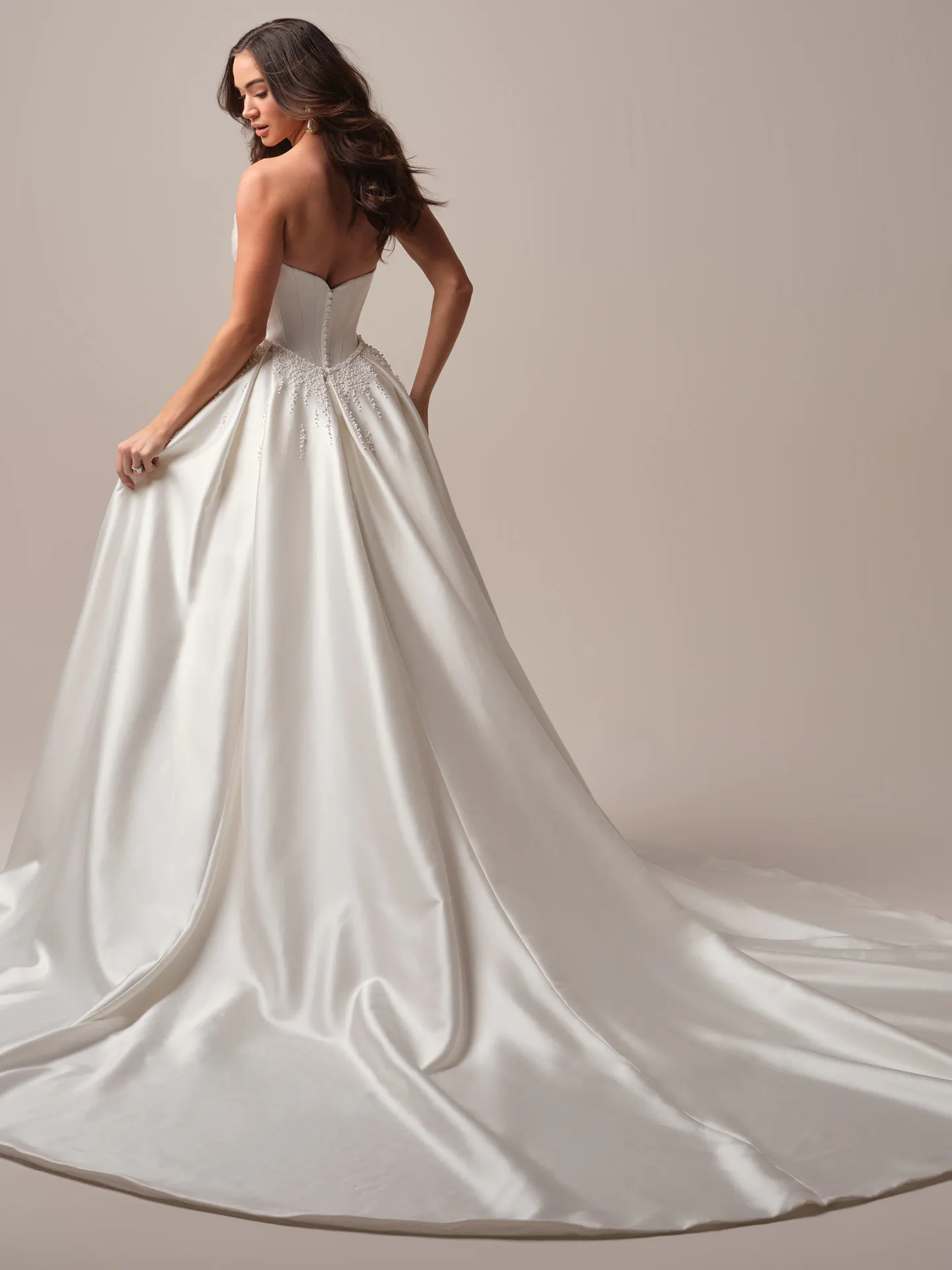 Maggie Sottero Melissa fit and flare wedding dress back view with fitted skirt