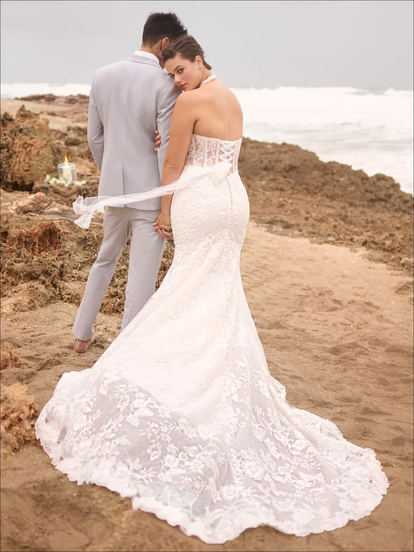 Maggie Sottero Meredith fit and flare wedding dress angled curve with contoured fit