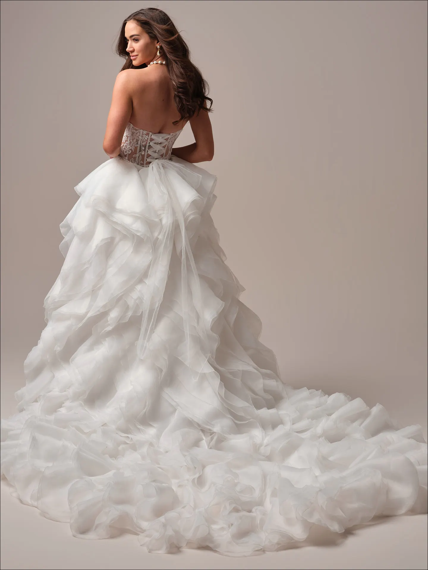 Maggie Sottero Meredith fit and flare wedding dress side profile with lace detail