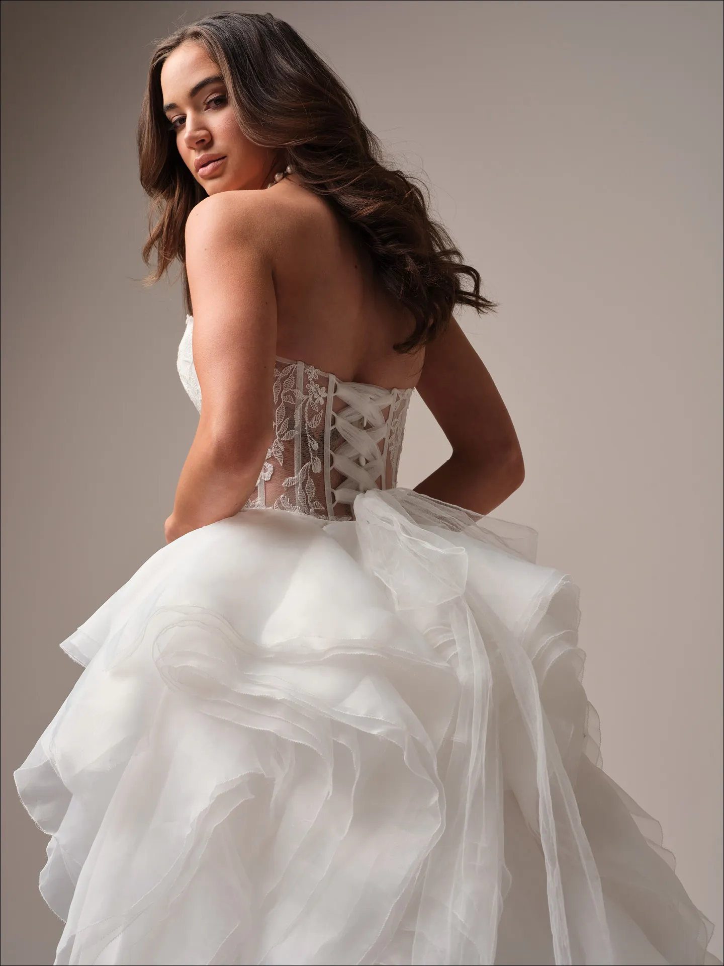 Maggie Sottero Meredith fit and flare wedding dress back view with extended train