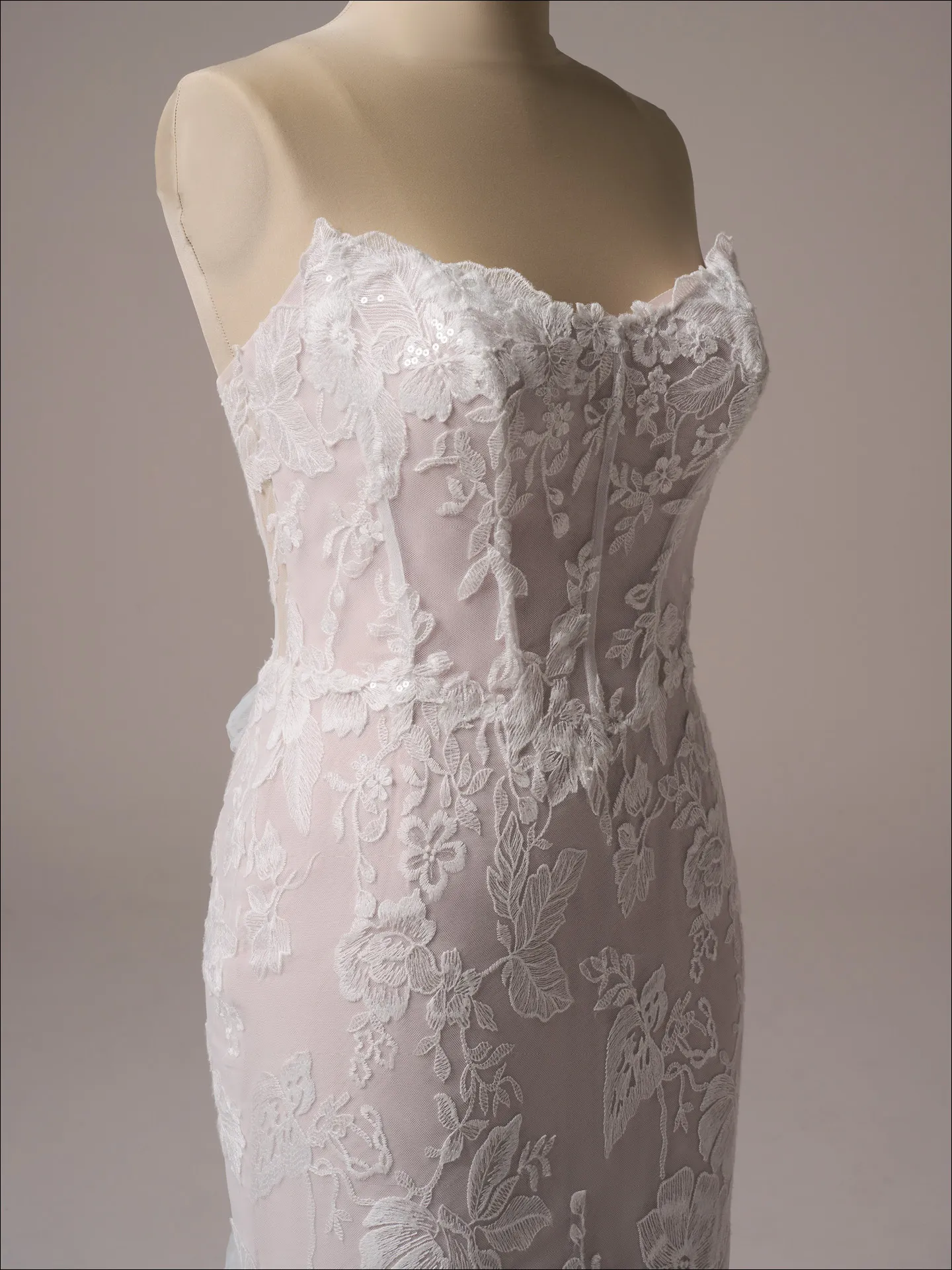 Maggie Sottero Meredith fit and flare wedding dress back view with sweeping train