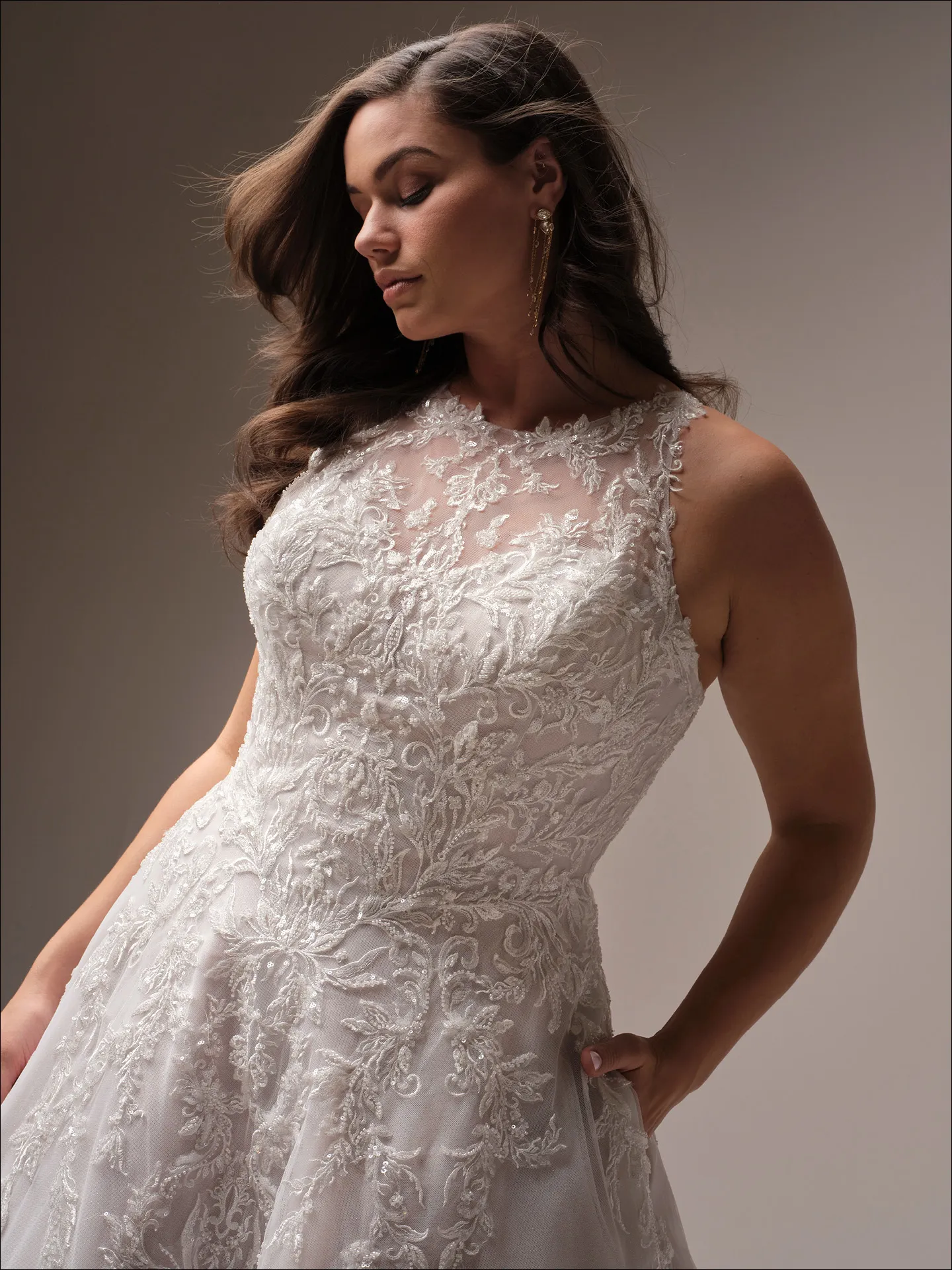 Maggie Sottero Nina A line wedding dress side view curve with flowing skirt