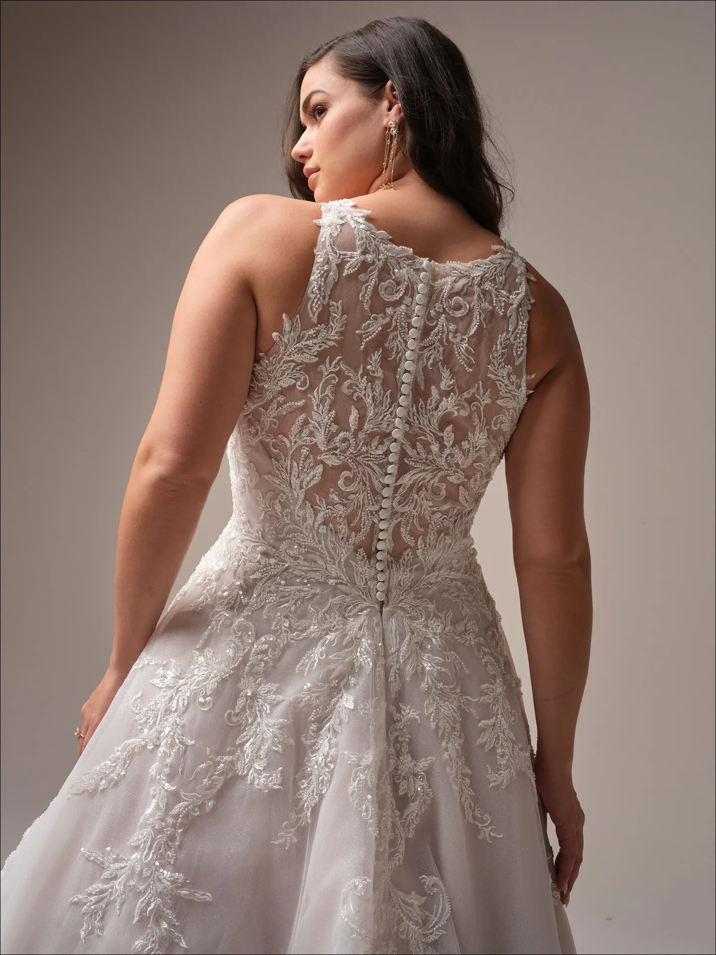 Maggie Sottero Nina A line wedding dress angled curve with fitted bodice