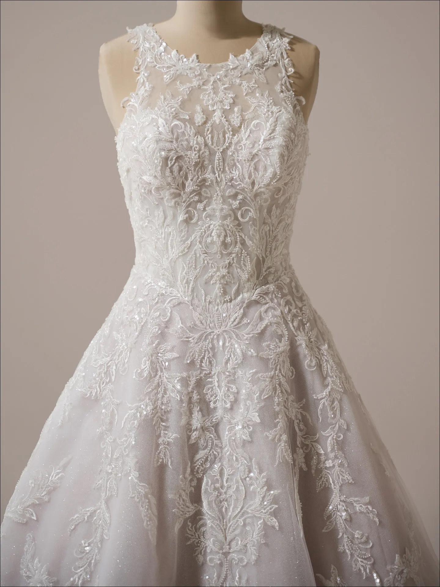 Maggie Sottero Nina A line wedding dress front view in soft ivory lace