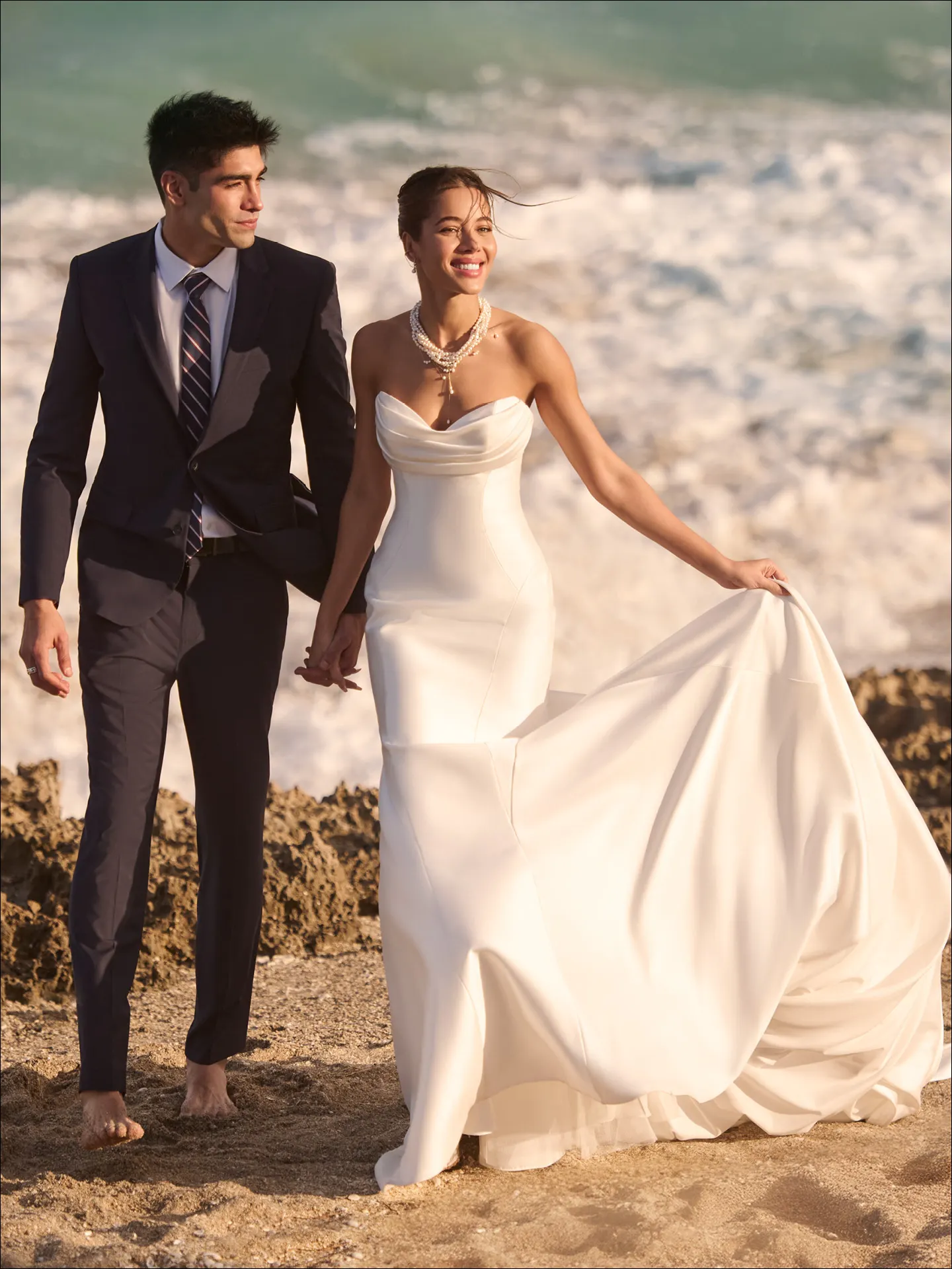 Maggie Sottero Odette fit and flare wedding dress side view with fitted silhouette