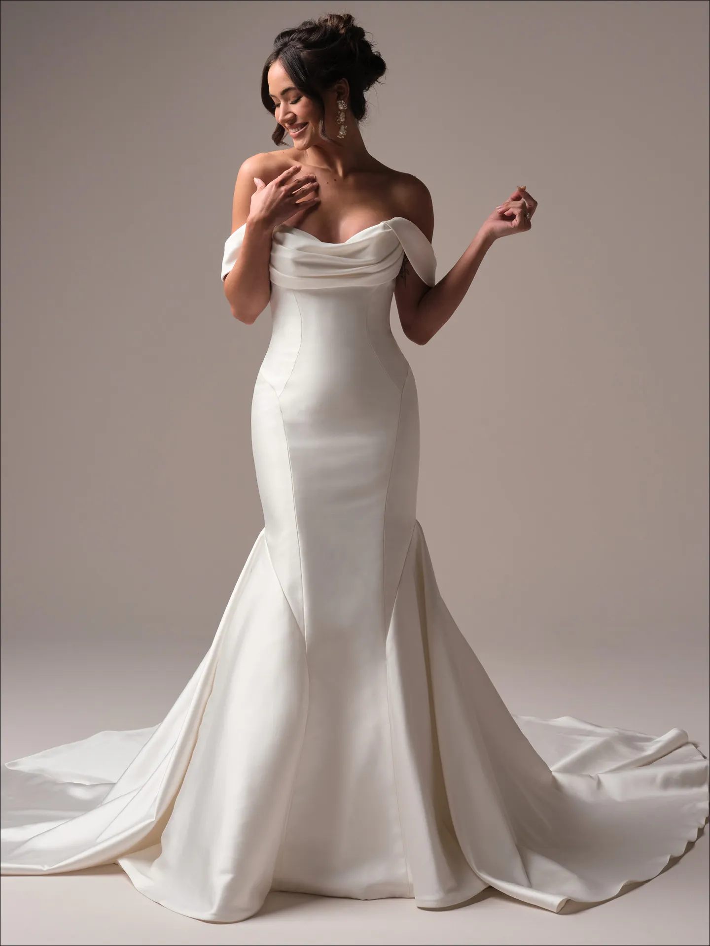 Maggie Sottero Odette fit and flare wedding dress side angle with contoured fit