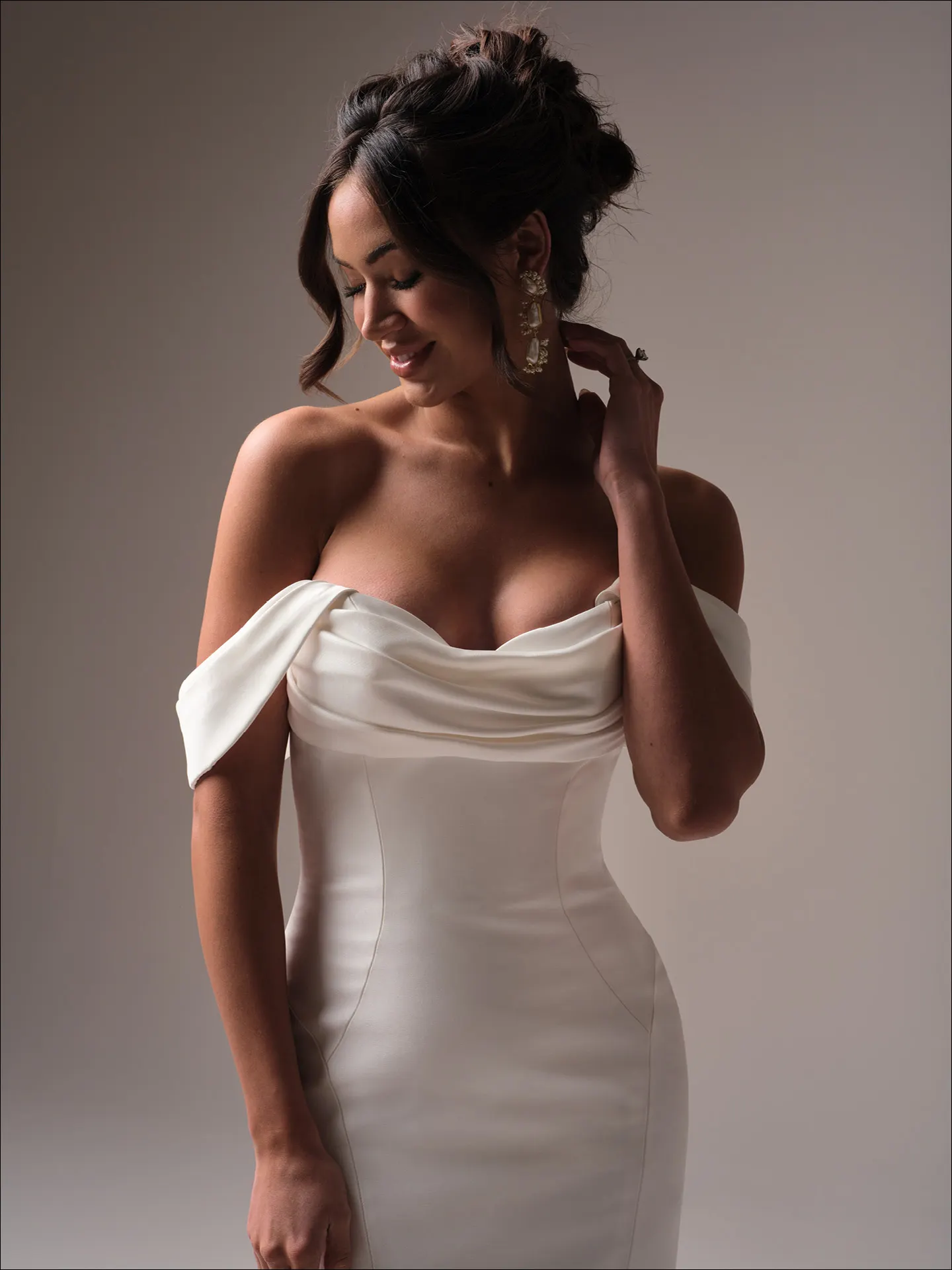 Maggie Sottero Odette fit and flare wedding dress side profile with lace detail