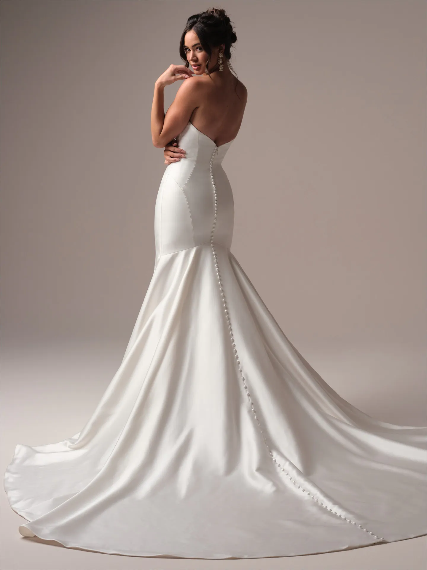 Maggie Sottero Odette fit and flare wedding dress front view with fitted bodice