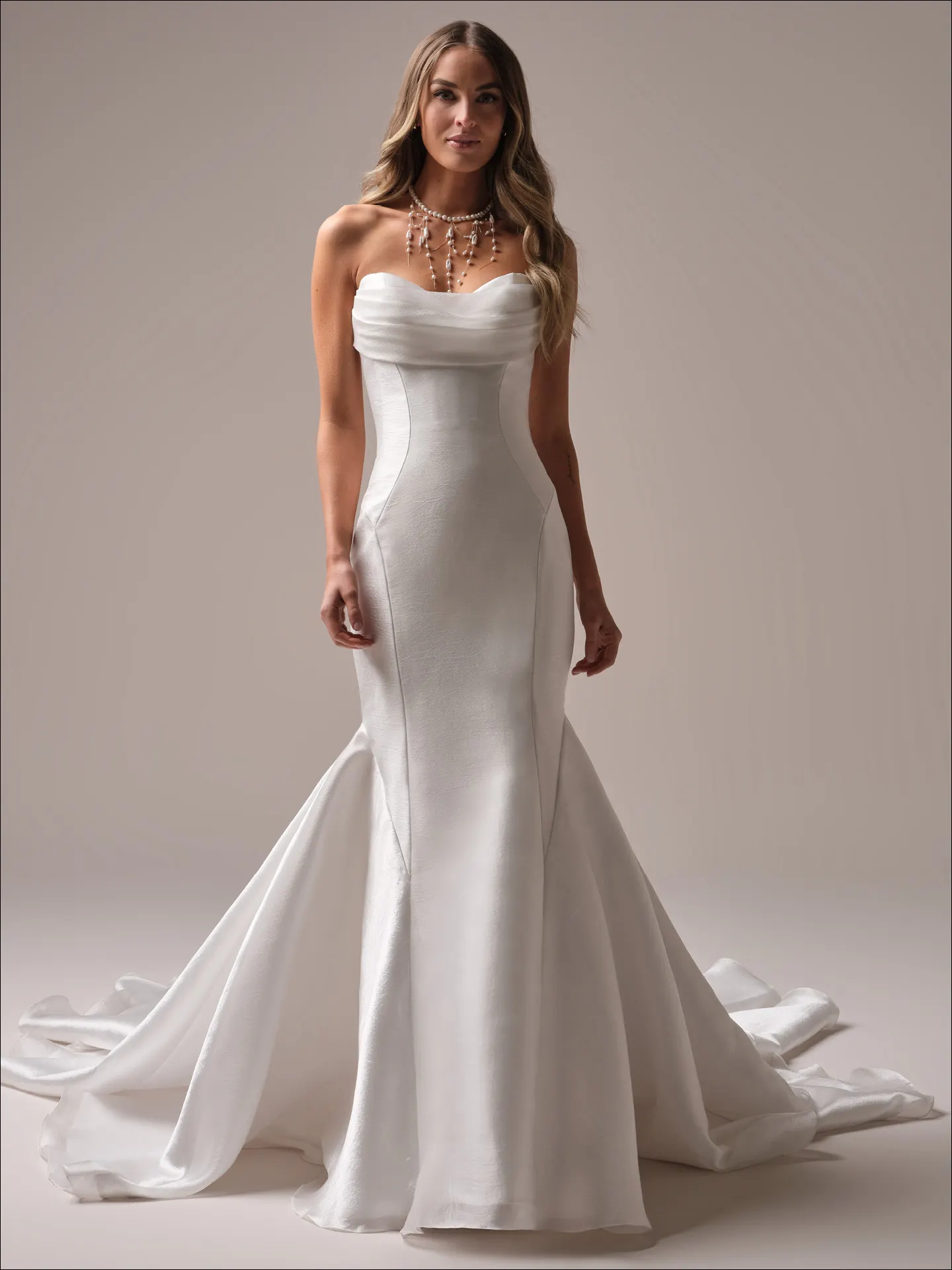 Maggie Sottero Odette Marie fit and flare wedding dress back view with lace train