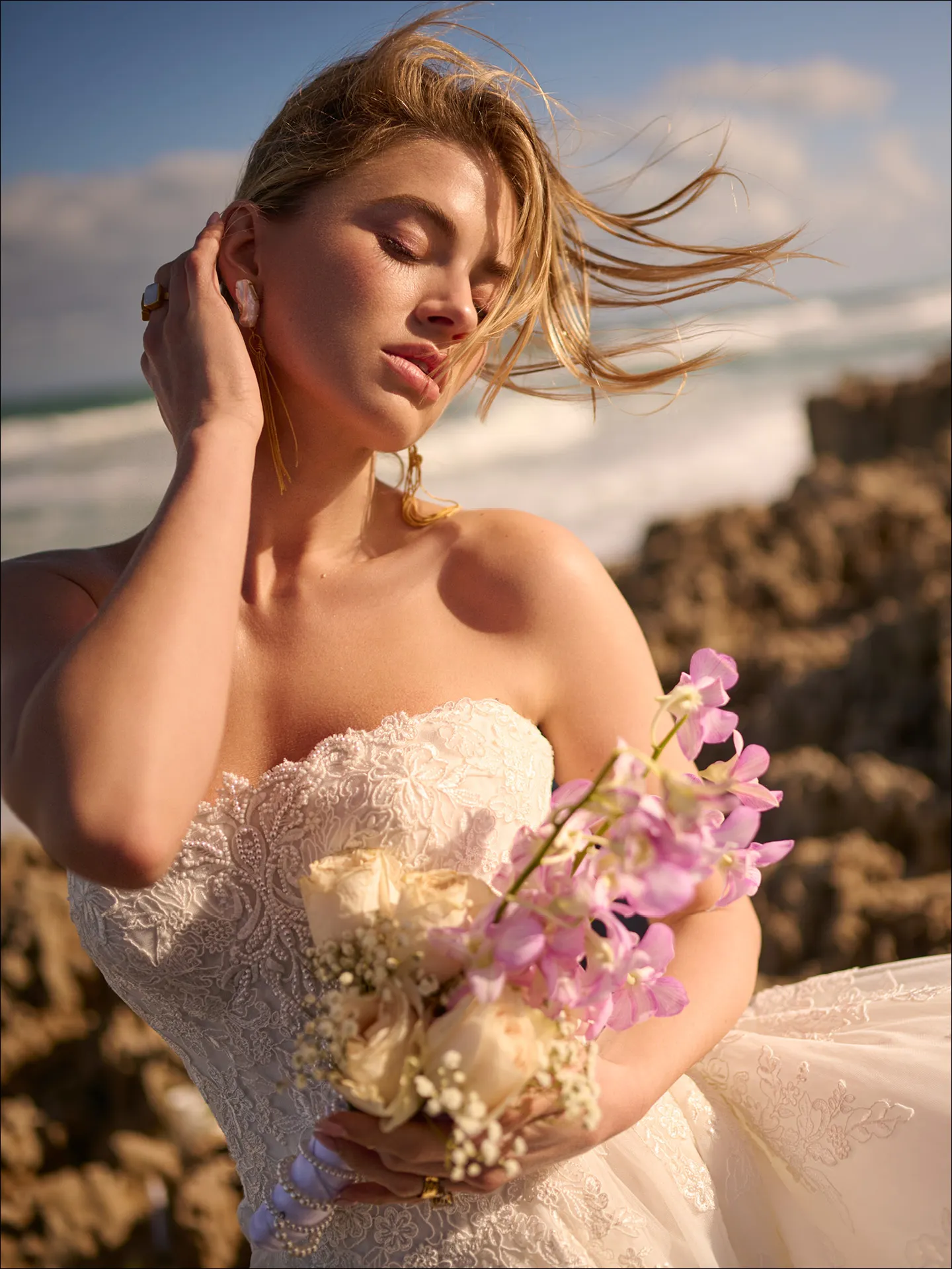 Maggie Sottero Prescott ballgown wedding dress back view with long flowing train