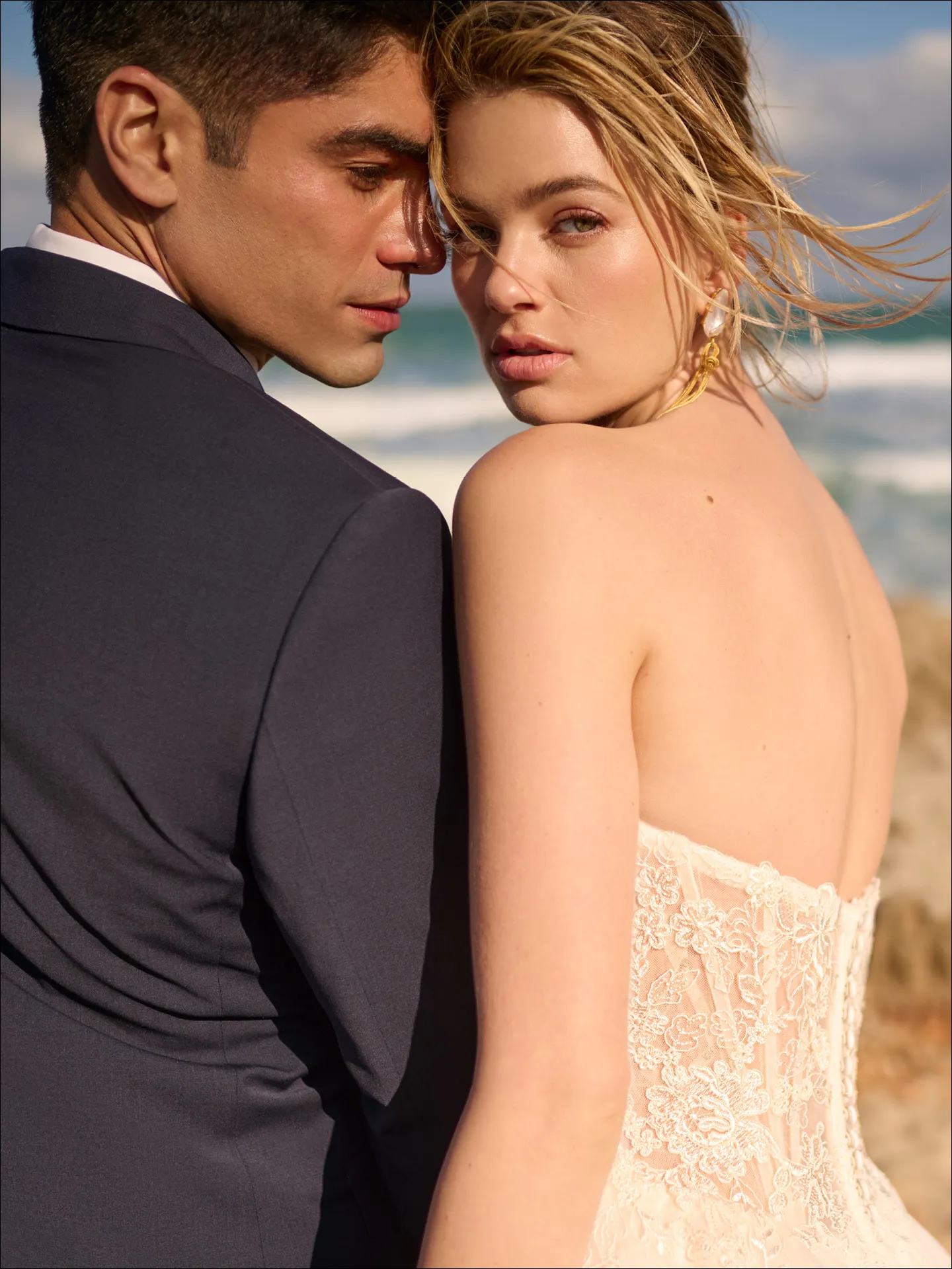 Maggie Sottero Prescott ballgown wedding dress back angle with extended train