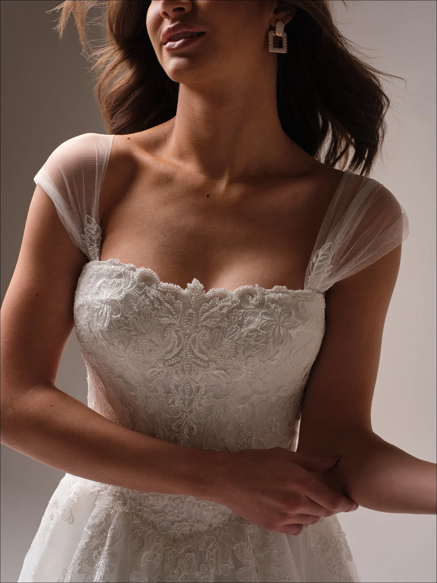 Maggie Sottero Prescott ballgown wedding dress side profile with structured bodice