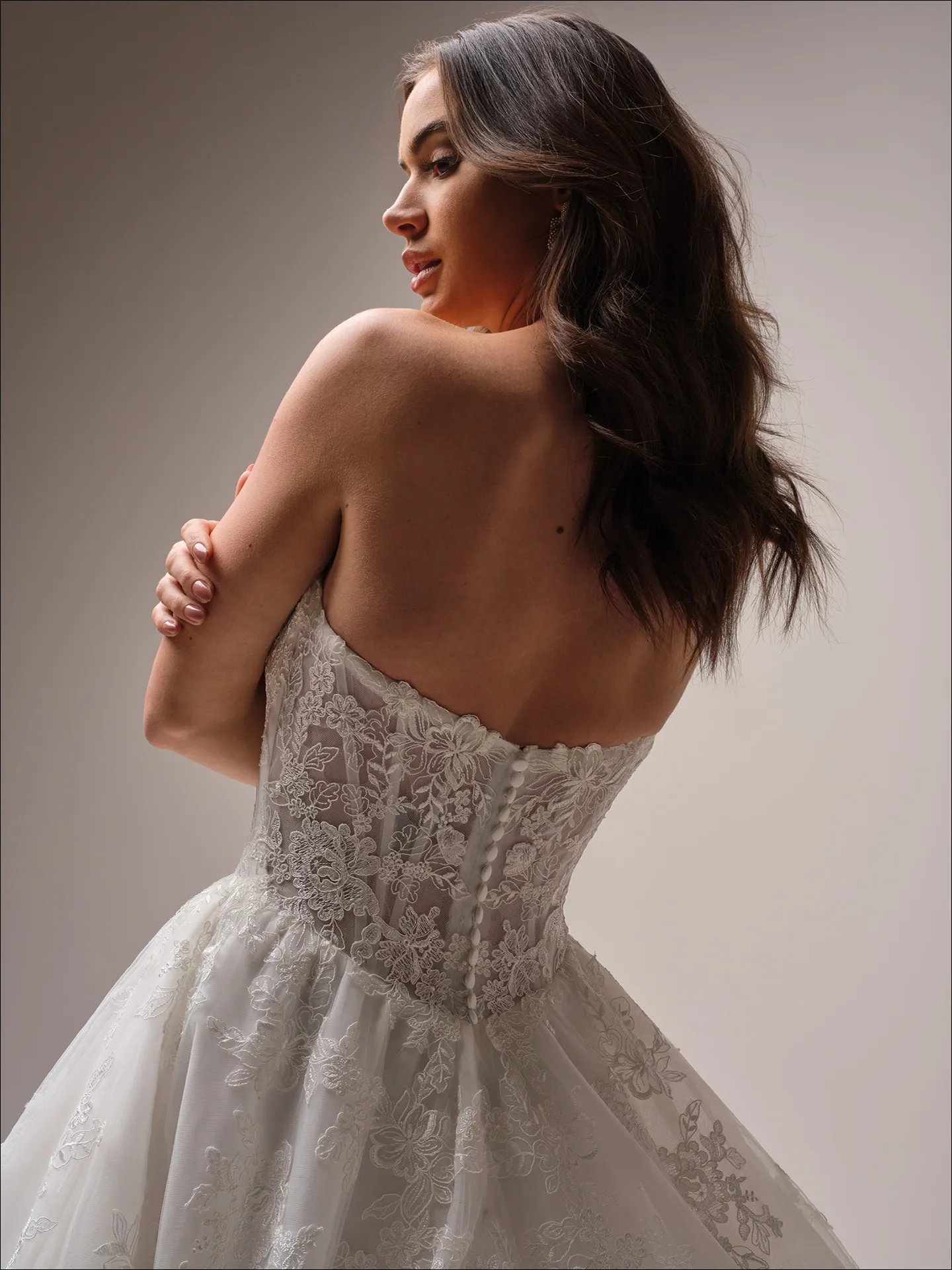 Maggie Sottero Prescott ballgown wedding dress back view with sweeping train