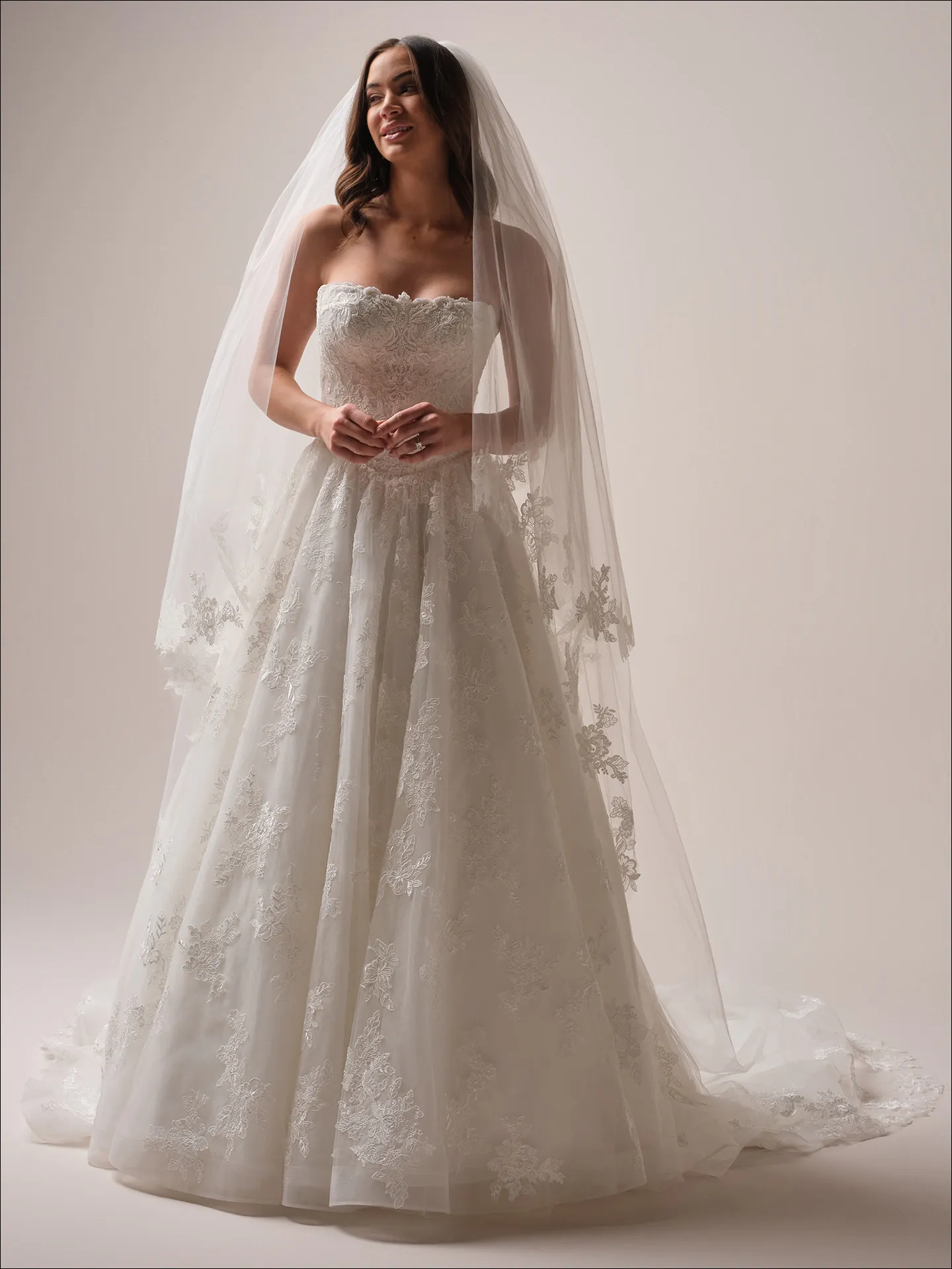 Maggie Sottero Prescott ballgown wedding dress back view with long tulle train